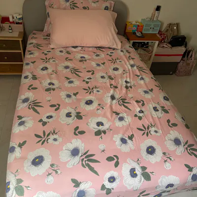 Customer home photo 9: The bed frame seems sturdy and the color is pleasing.