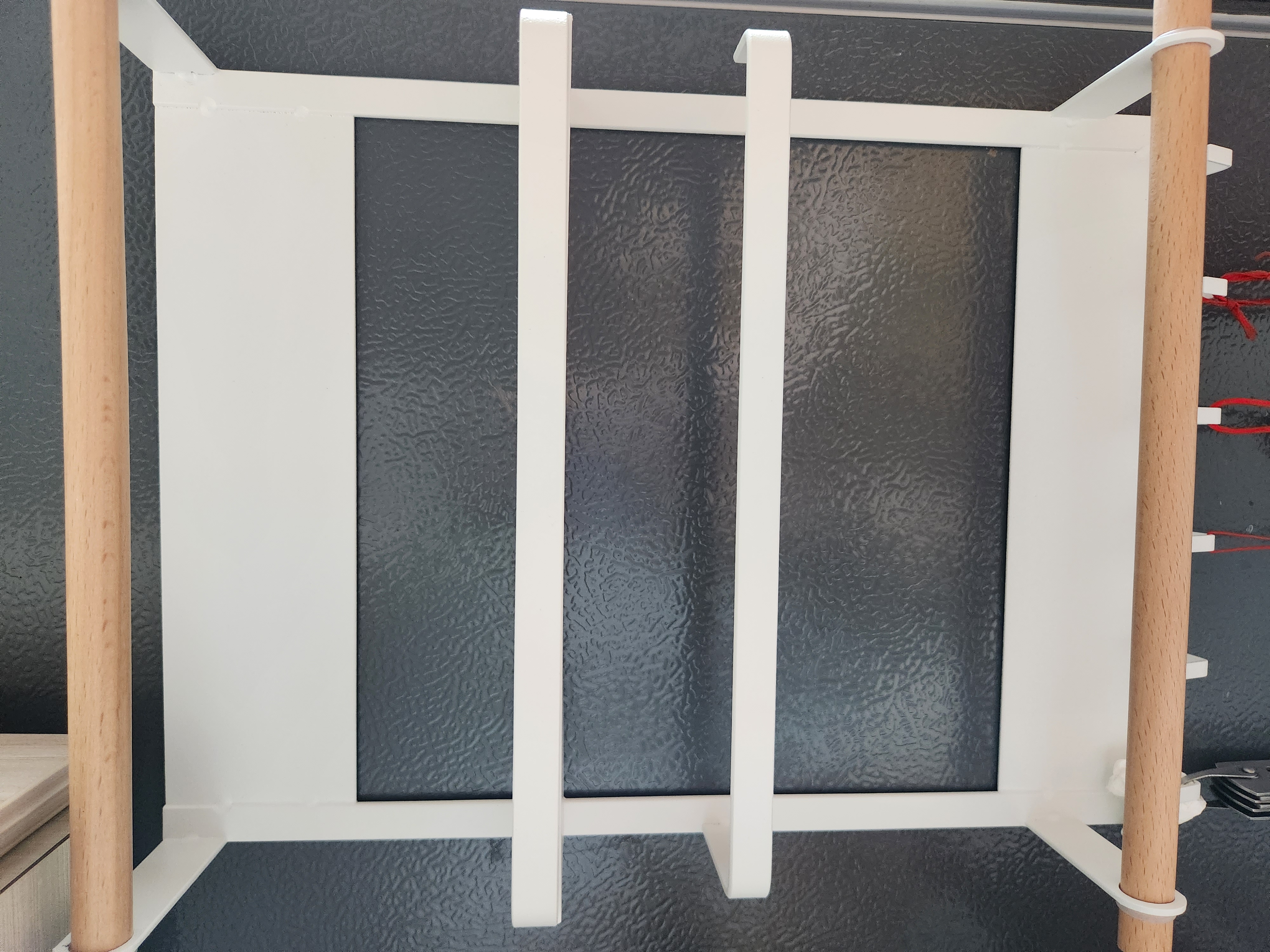 Customer home photo 2: Like the strong magnetic pates that can firmly attach to the fridge. The light wooden colour handles is my favourite design too.