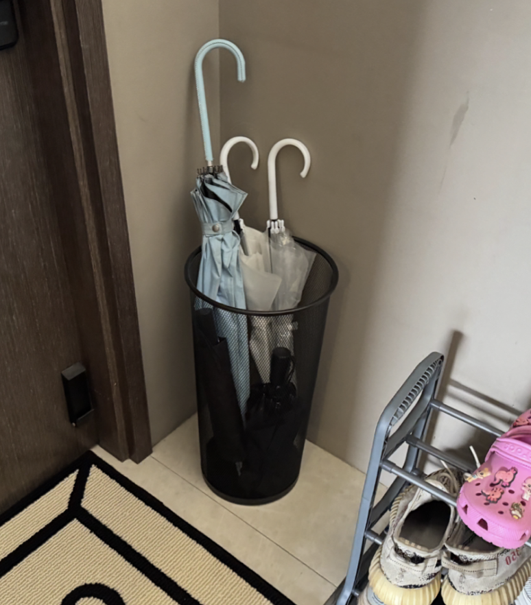 Customer home photo 1: nice and sturdy umbrella holder for the price.