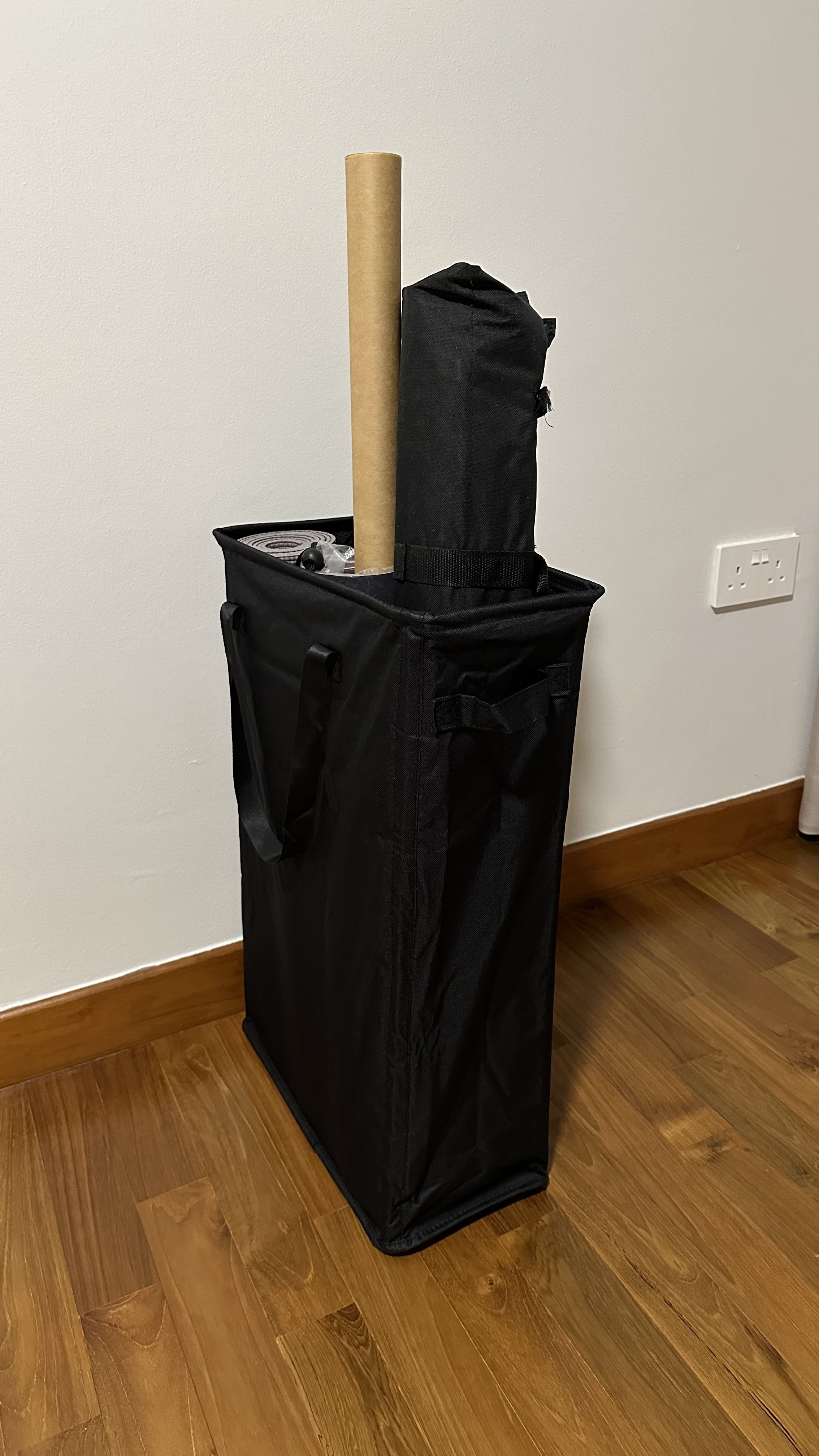 Customer home photo 2: love it. sturdy enough and i use it for yoga mat & tripod holder