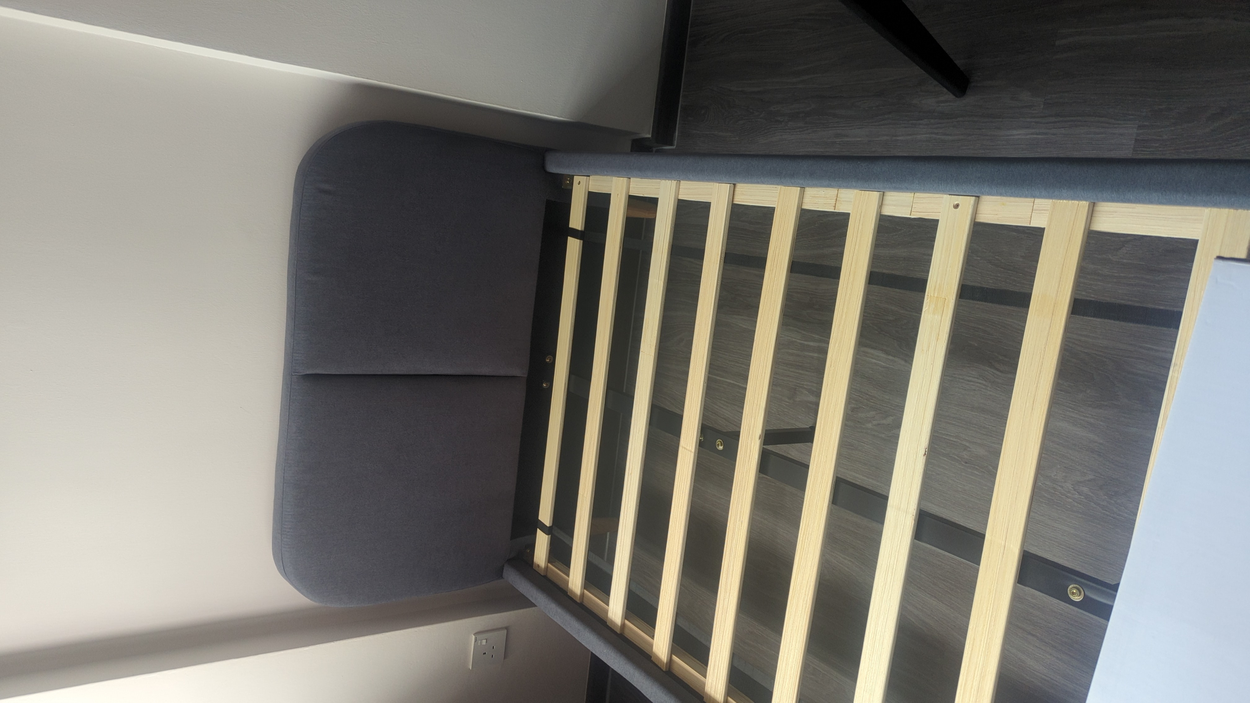 Customer home photo 8: Bed was delivered quick and on time. Feels very stable. Did not expect 2 center legs, but the bed frame came with it. This makes the whole frame more sturdy and able to withstand heavier mattresses.