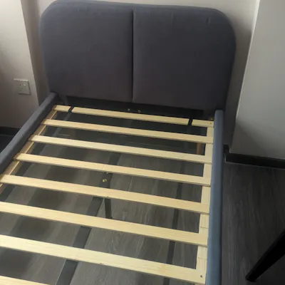 Customer home photo 8: Bed was delivered quick and on time. Feels very stable. Did not expect 2 center legs, but the bed frame came with it. This makes the whole frame more sturdy and able to withstand heavier mattresses.