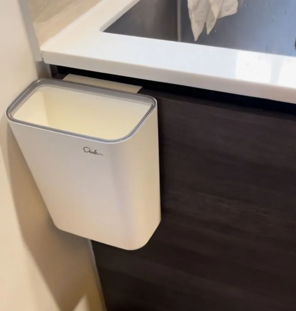 Customer home photo 3: it's light and easy to hand on the cabinet, do note the cover  is easy to fall off so secure it properly.