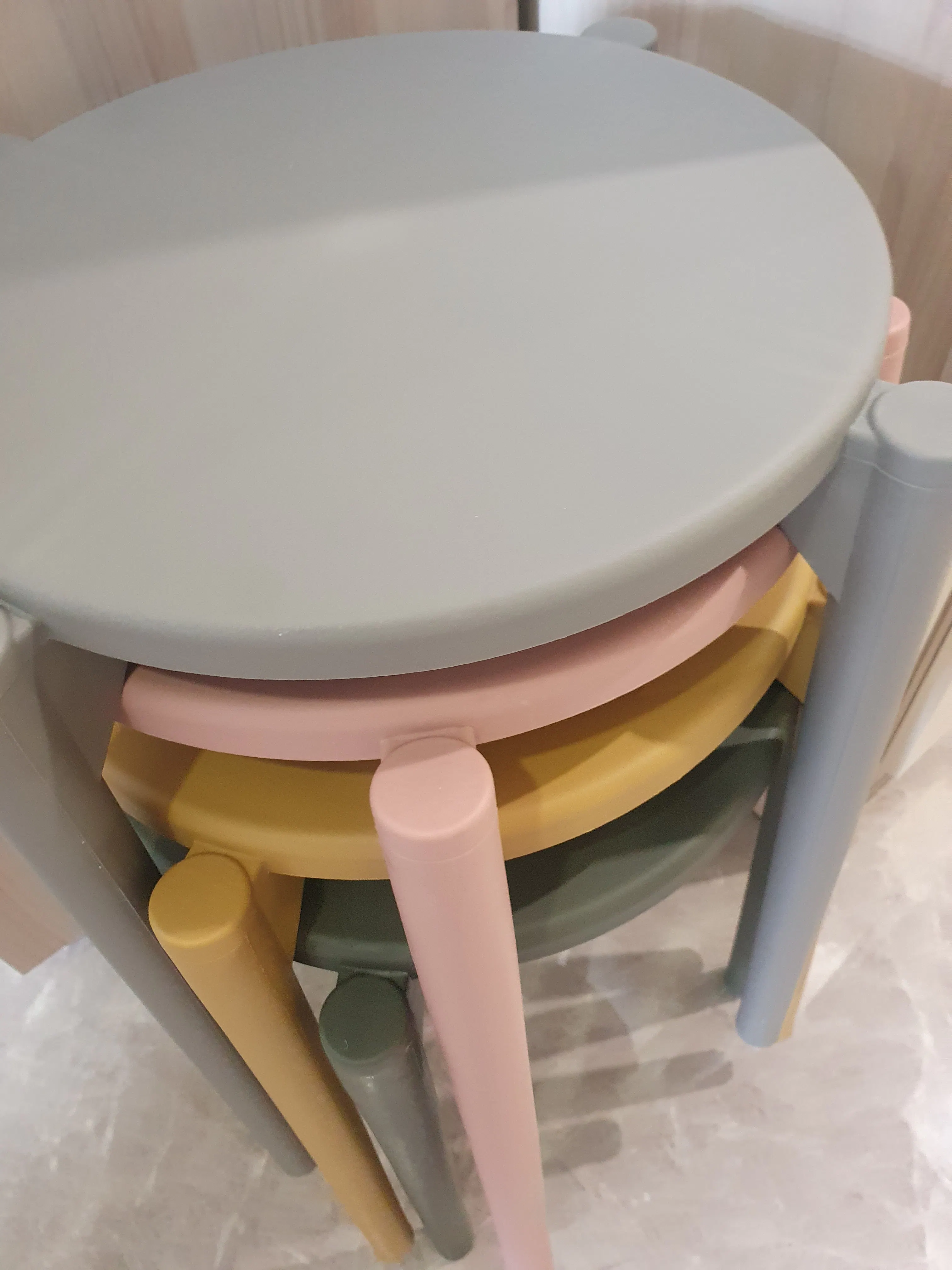 Customer home photo 3: Love these stools! Colour fits my house well and very sturdy. Can stack together. Looks good even as a decor piece.