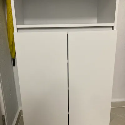 Customer home photo 10: The size is suitable to place behind my front door. Need to organise in order for more shoes space. Price is okay, but not sure if the white color will turn into yellowish over the time.