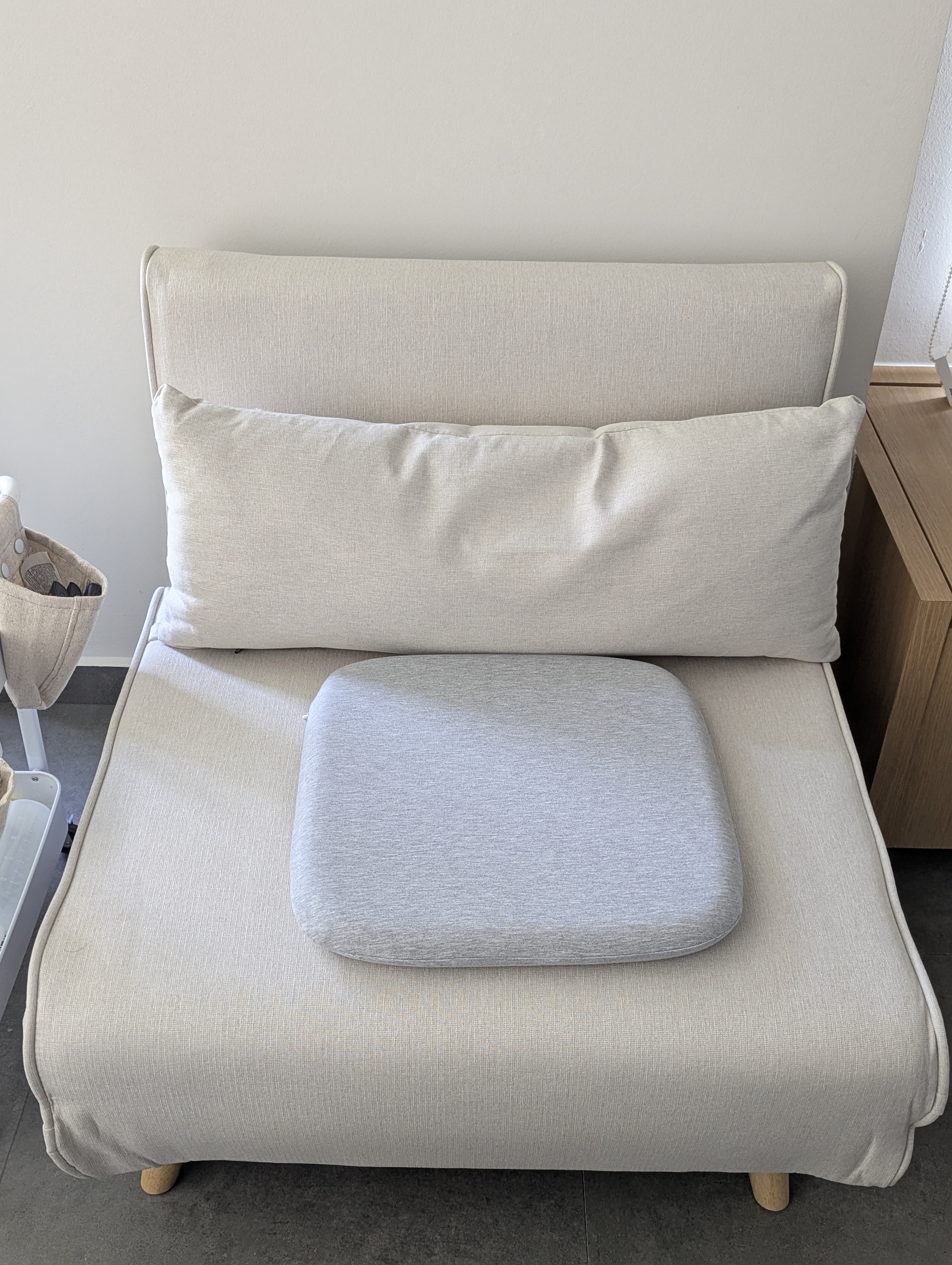 Customer home photo 3: The color and size matches the overall layout. Comfort wise was what advertised, a firm seat. Was initially torn between a lounge chair and a sofa bed but the latter is more utilitarian where I can host a guest for stay over. More importantly it is way way cheaper.