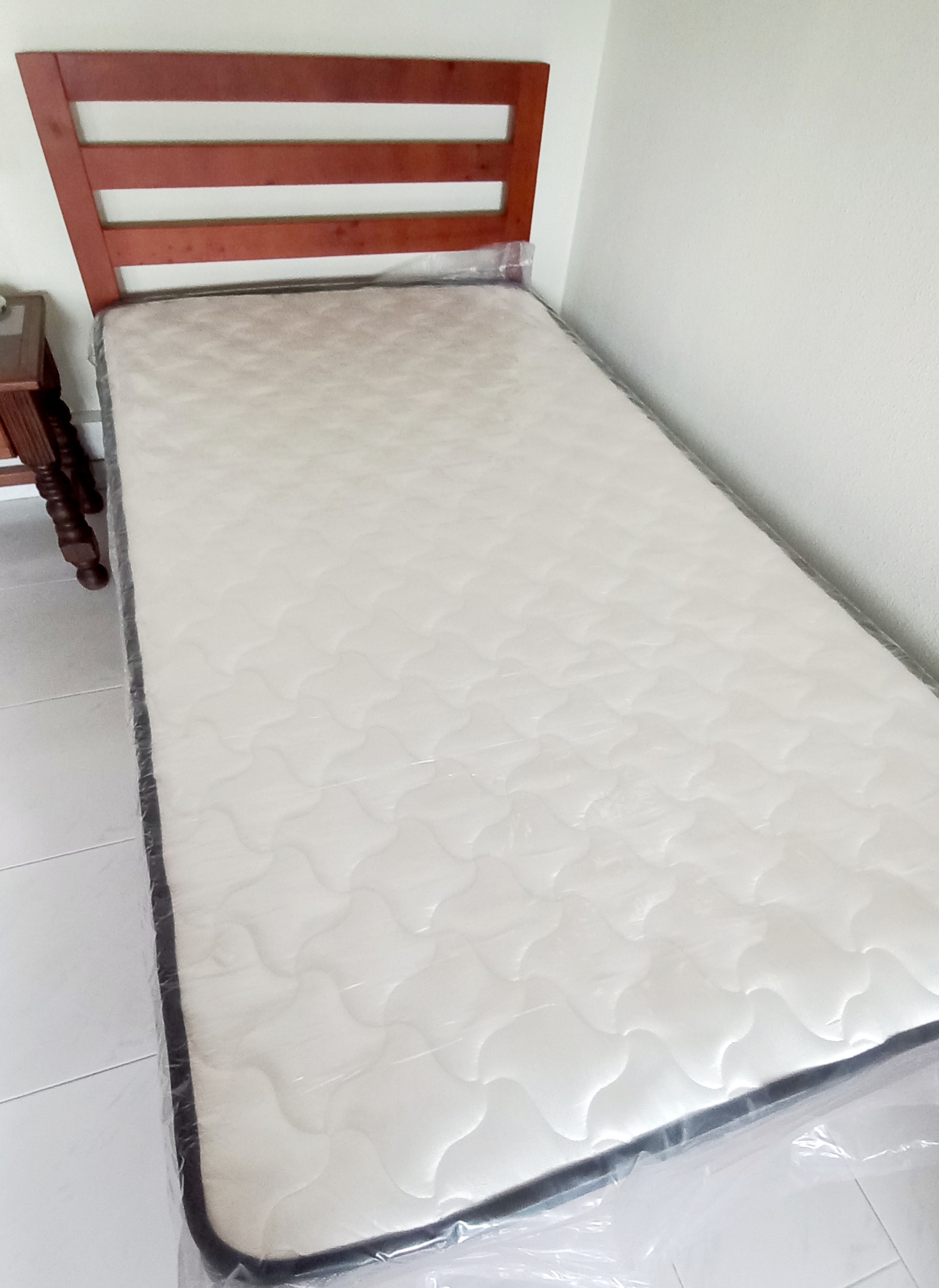 Customer home photo 8: Solid frame and nice design. The size is just right for the room. Assembly was fast too.
