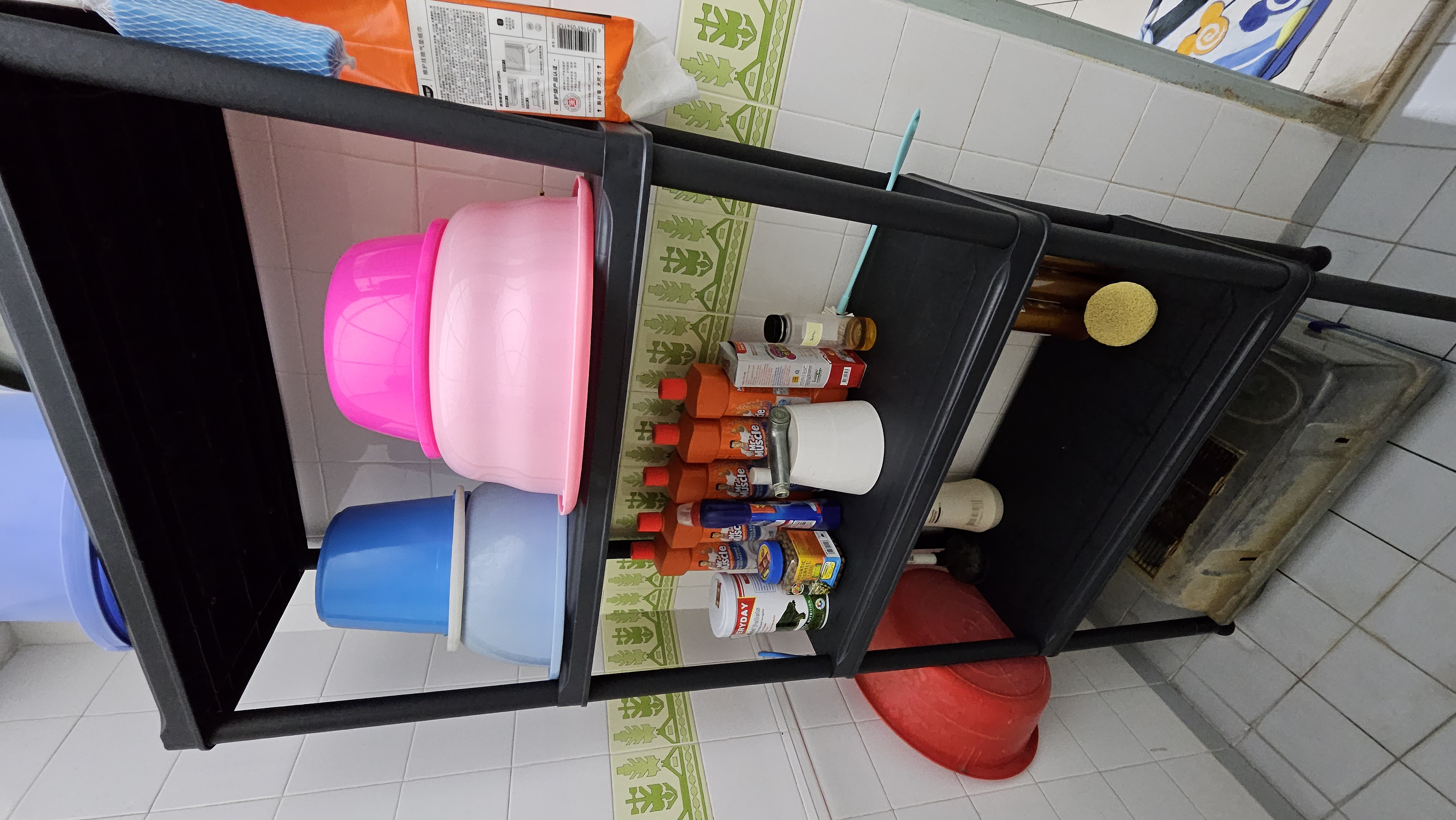 Customer home photo 2: Nice and sturdy setup in my bathroom for storage. No fear of rust since its plastic!