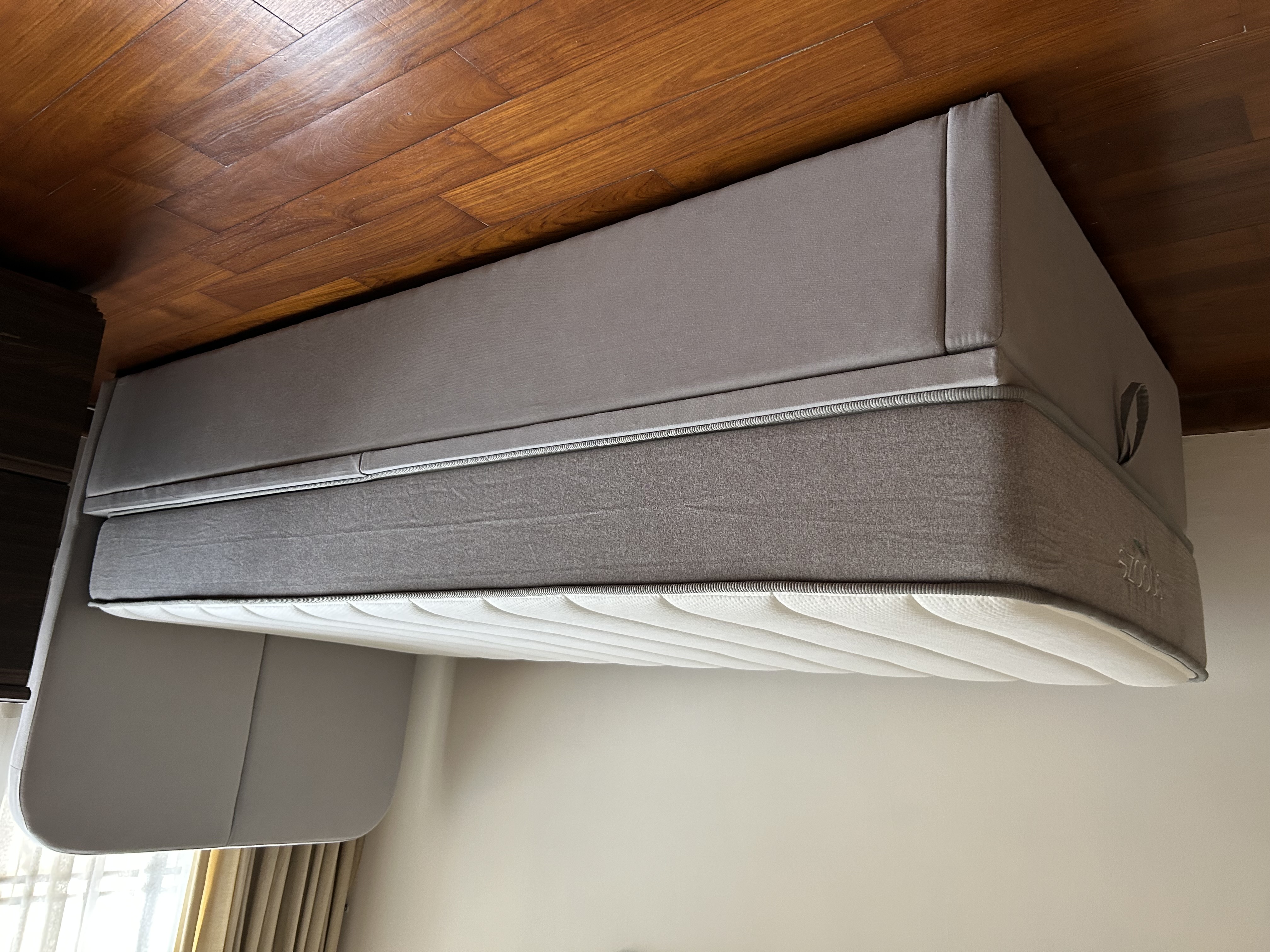 Customer home photo 4: Great single storage bed. Perfect spare bed for guest room. Would have given this a 5-star rating if the base of the storage area had been solid instead of a piece of fabric velcro-ed to the bottom of the bedframe.