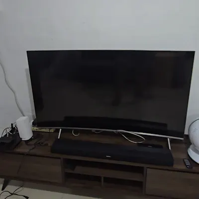 Customer home photo 5: Price is really affordable and good length for 55'' TV... love the wood grain design. Nice!