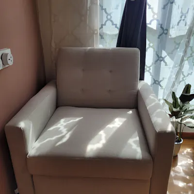 Customer home photo 2: I like the quality of the material its smooth to touch and not rough compared to some sofa bed I check around. Its easy to make it into sofa bed.