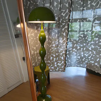 Customer home photo 10: Thank you for the prompt delivery. The lamp really fits the theme of my apartment. Only hiccup was fixing the lamp without any manual instructions but was able to after awhile.