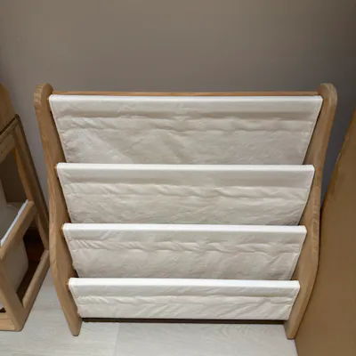 Customer home photo 1: It matches the wooden kid toy storage well.