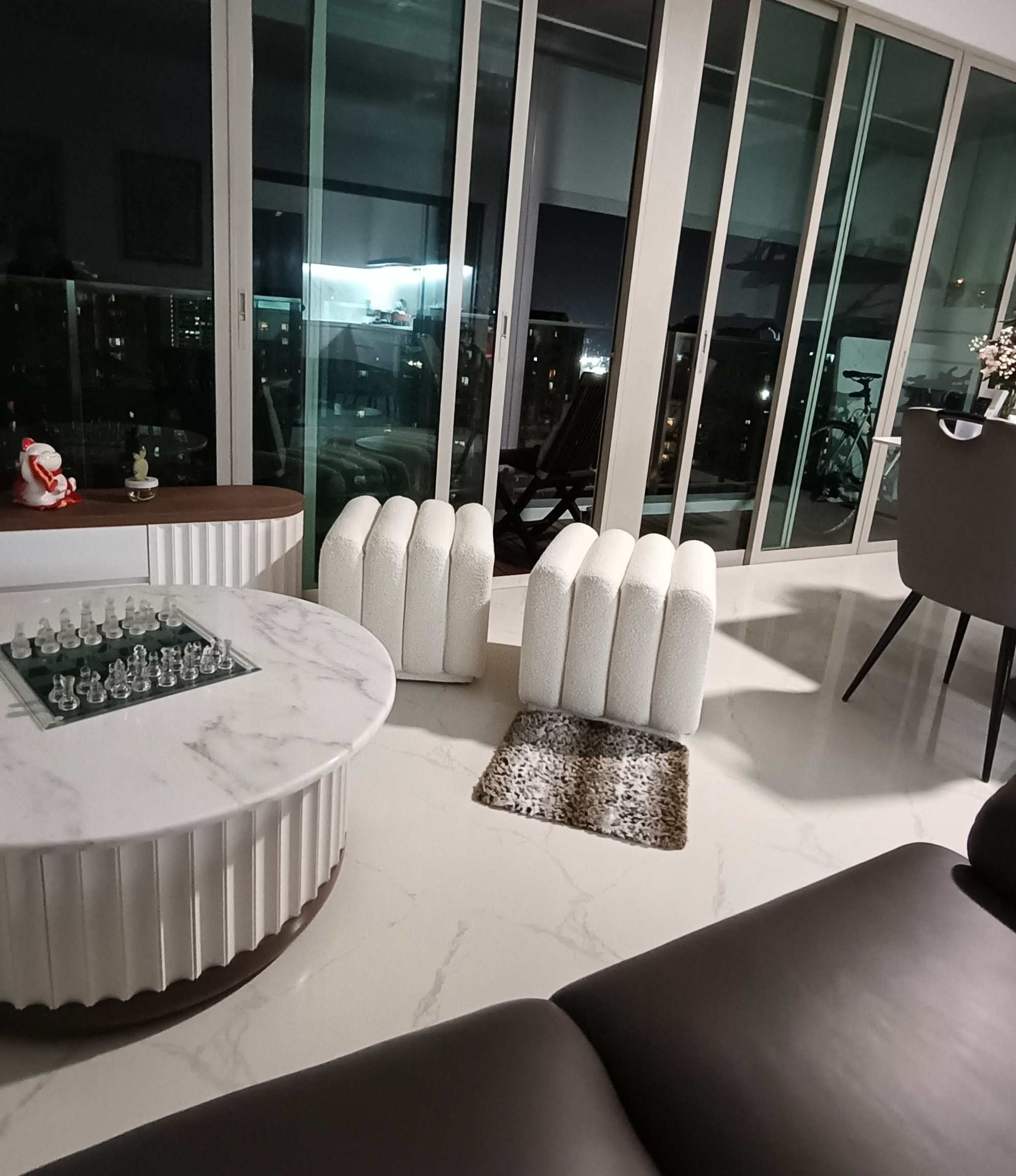 Customer home photo 7: Beautiful stools for my living room! Love the really cool design and the sturdiness. The cushions are a tad too firm... would prefer a little softer.