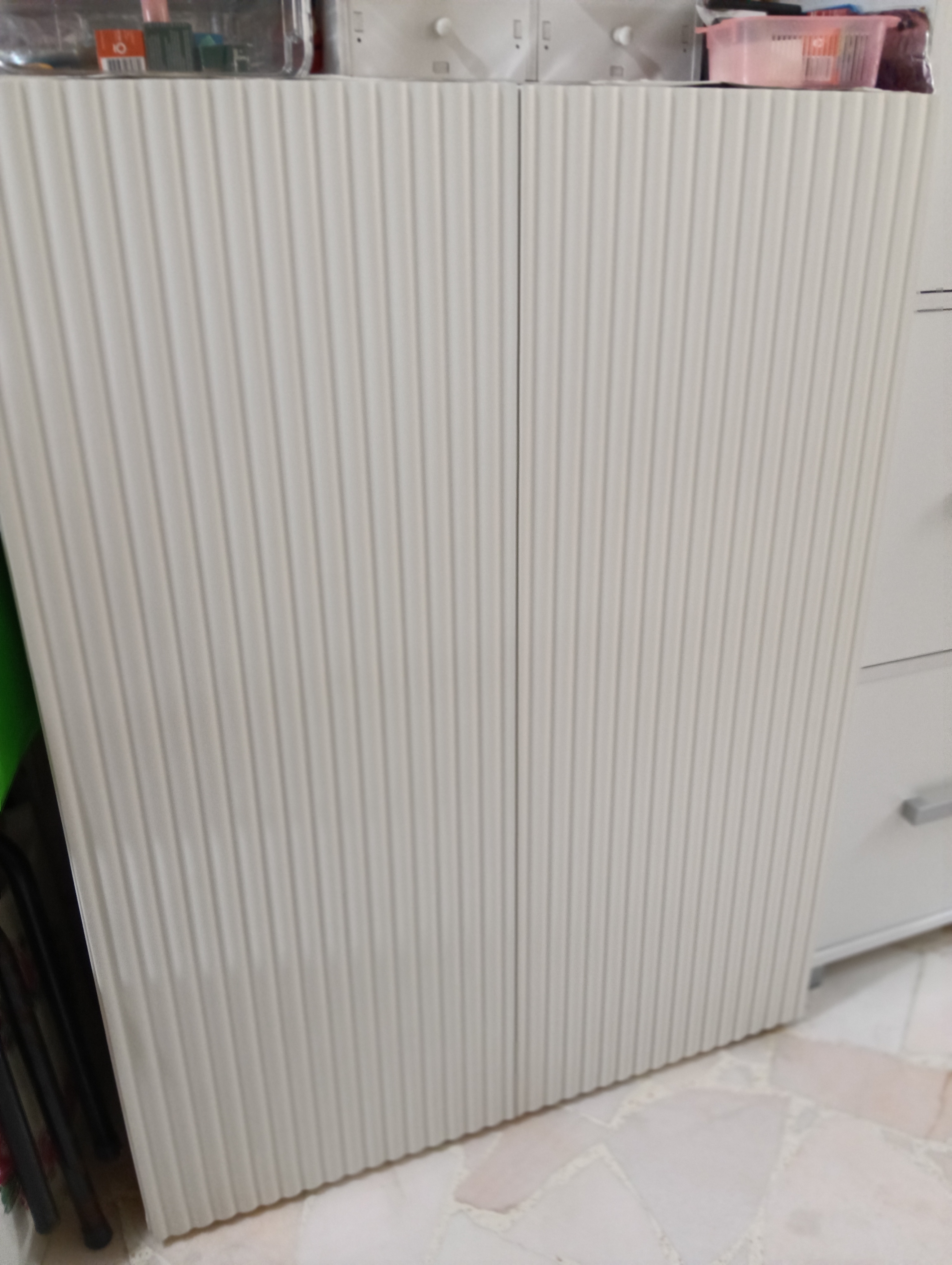 Customer home photo 37: The cabinet quality is good and quite solid. I like the design — it’s simple yet classic. The cabinet fits perfectly in my space.