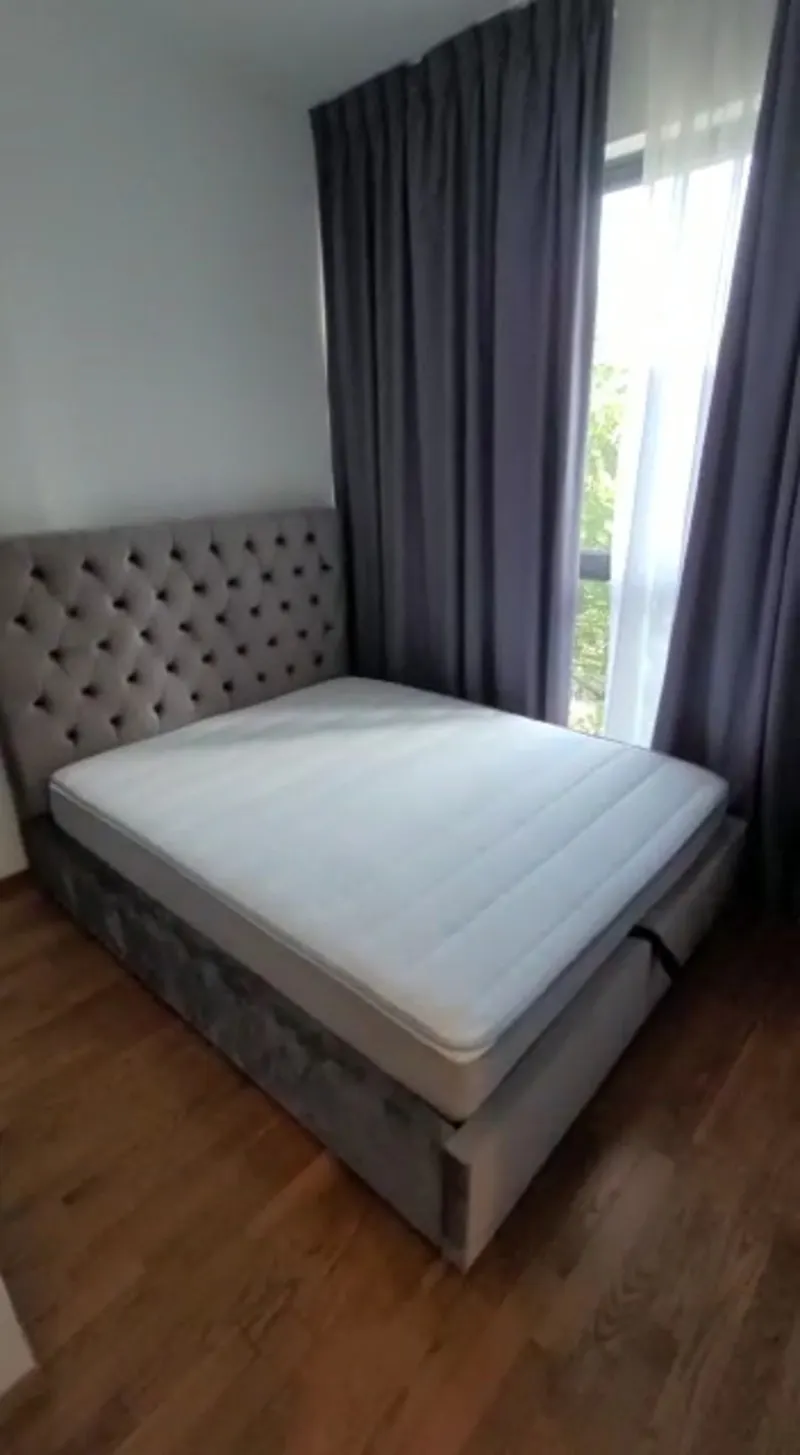 Customer home photo 32: We ordered the bed frame and mattress together. Product arrived on time. Assembled quickly and professionally by the team. The only thing with the mattress is that it takes 7 days, as mentioned by the team member, to fully have its form. Otherwise, great purchase and happy so far.