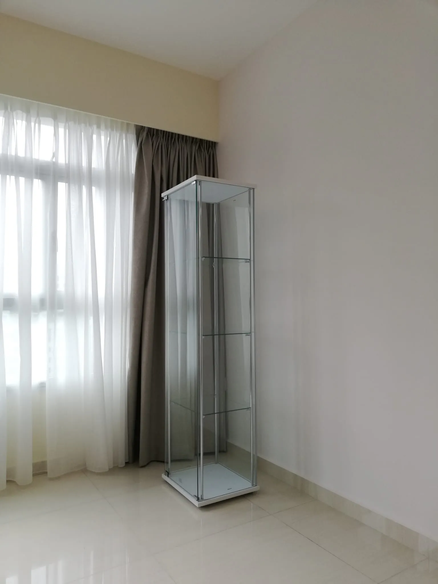Customer home photo 9: Good quality glass cabinet. 2 workers are very patient and skillful when they install the cabinet. Happy with the purchase