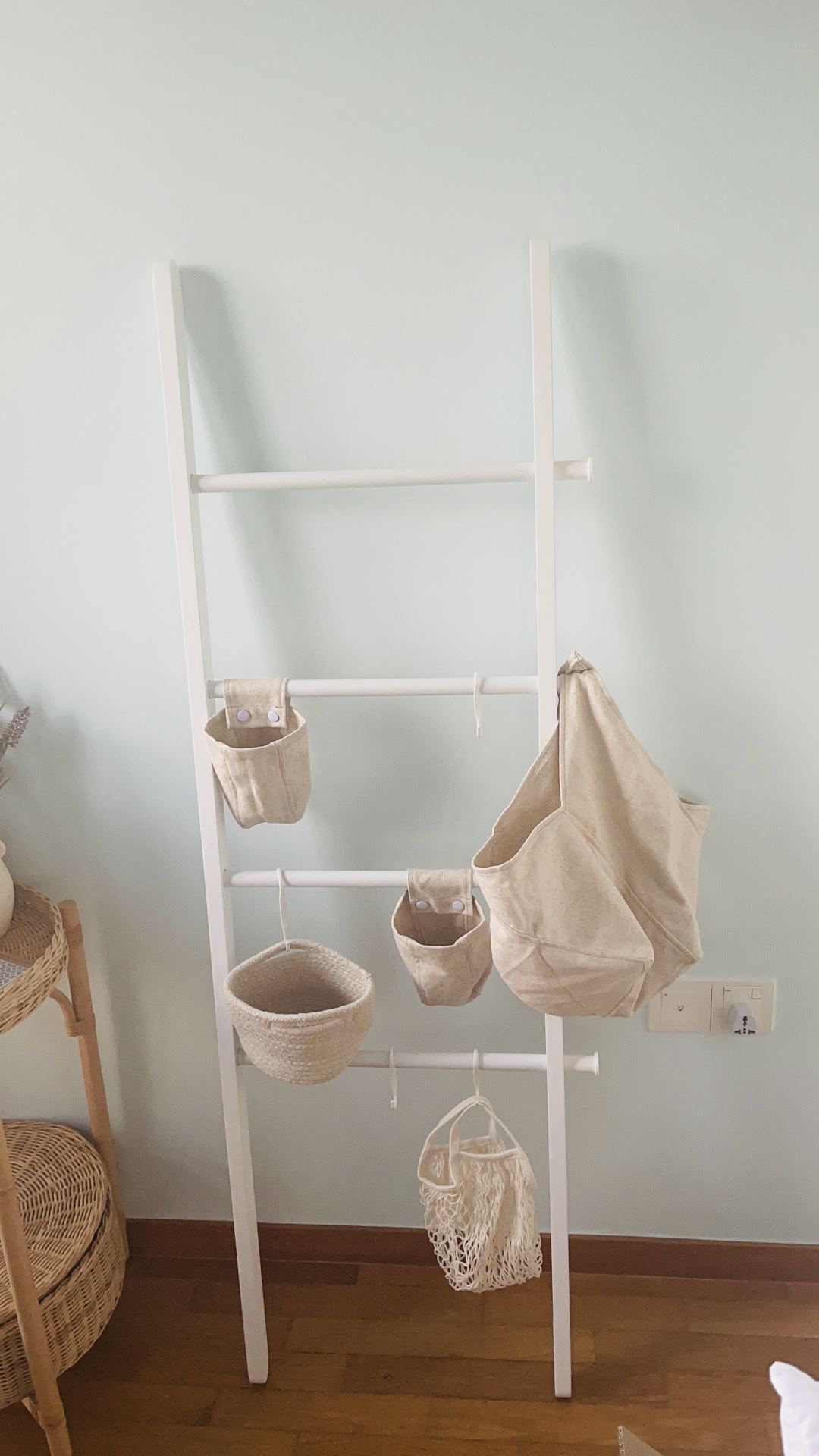 Customer home photo 4: This is the perfect storage/hanger solution for small guests rooms. The ladder is sturdy and super easy to assembly with no tools needed. I used some ikea accessories to complement it.