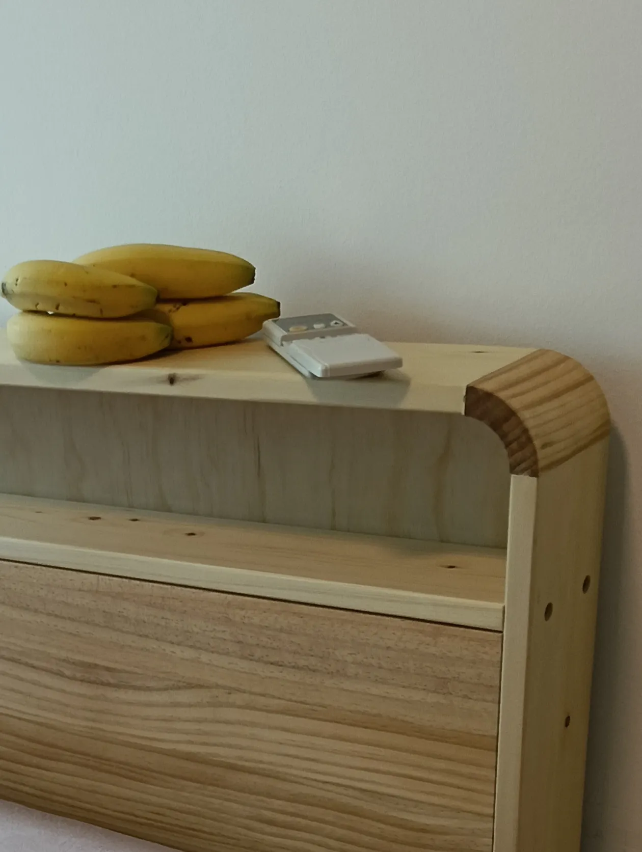 Customer home photo 7: The headboard has a serene and sweet look about it.... and the headboard ledge is wide enough to hold my aircon remote and my. 🍌banana snack too! I am contented.
