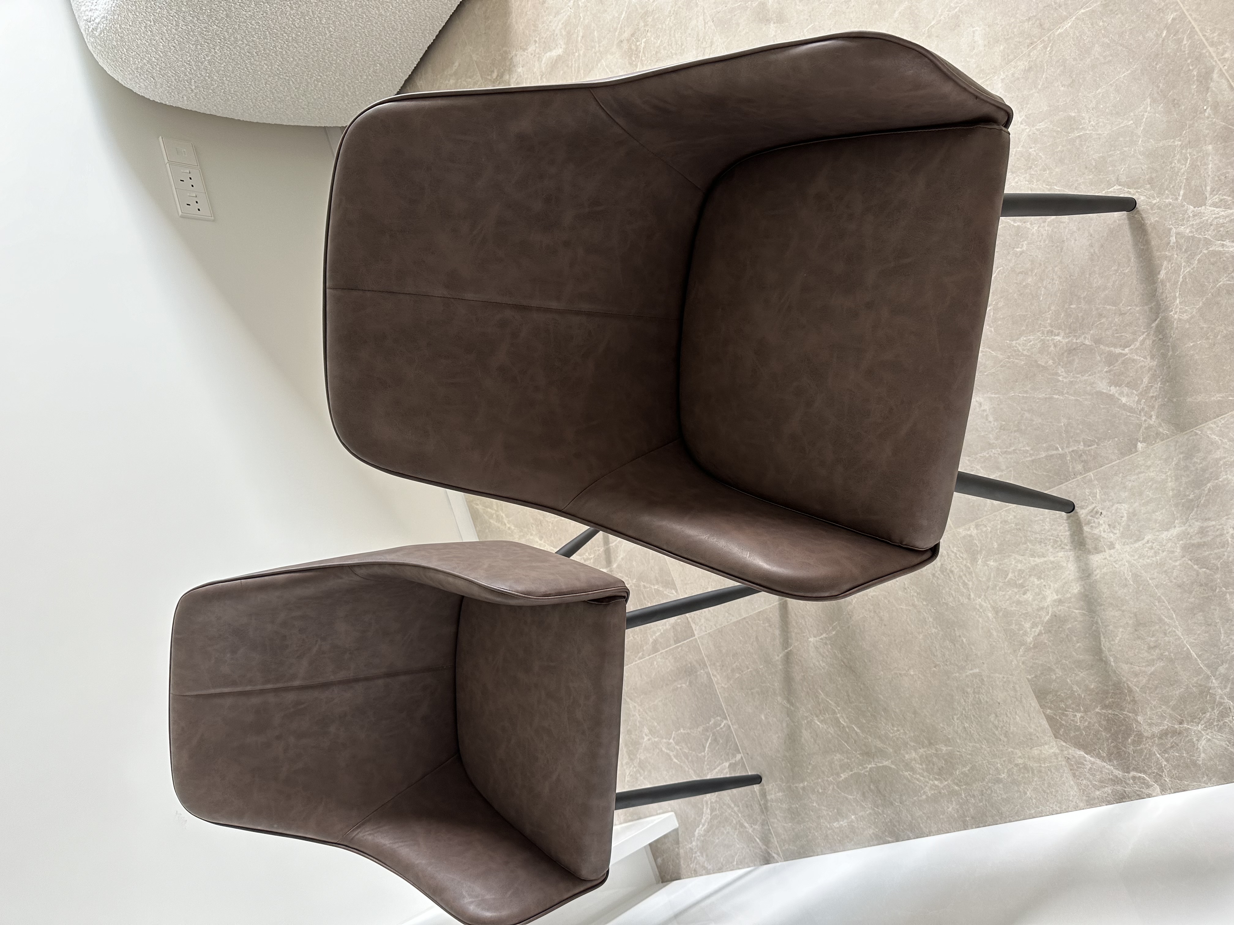 Customer home photo 4: Very nice and good sitting comfort. Not too heavy to move around but still very good quality.