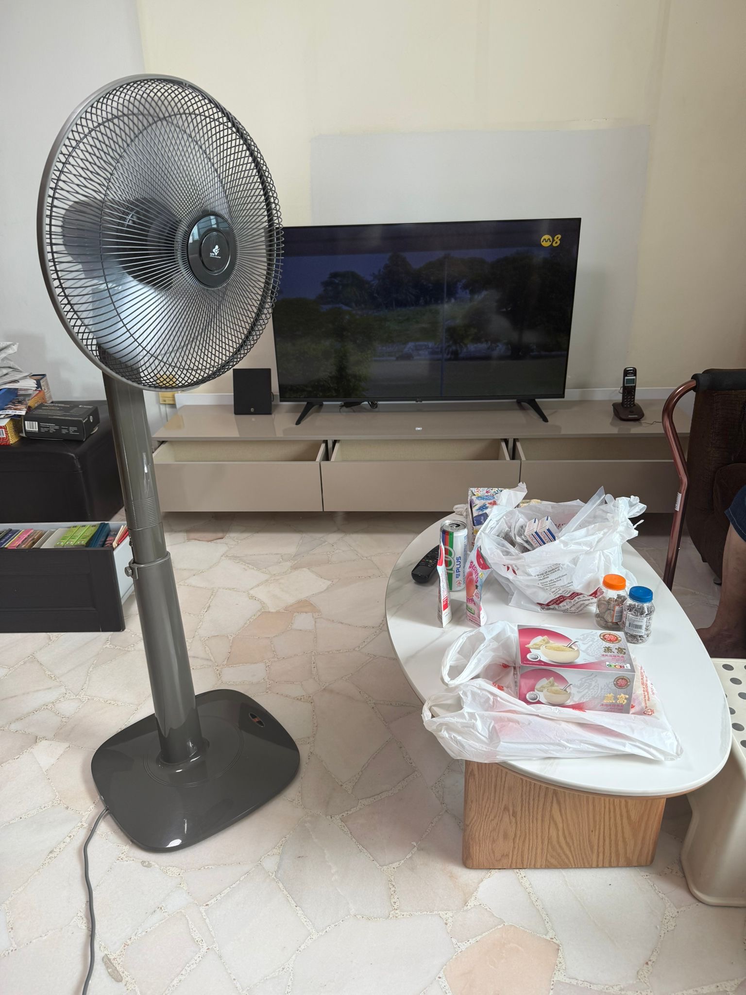 Customer home photo 4: Set up was done professionally by 2 nice guys. Set up was fast and the product was of quality. A little surprised that the power plugs are not local ones but adaptors are provided for. Nice and easy to use.