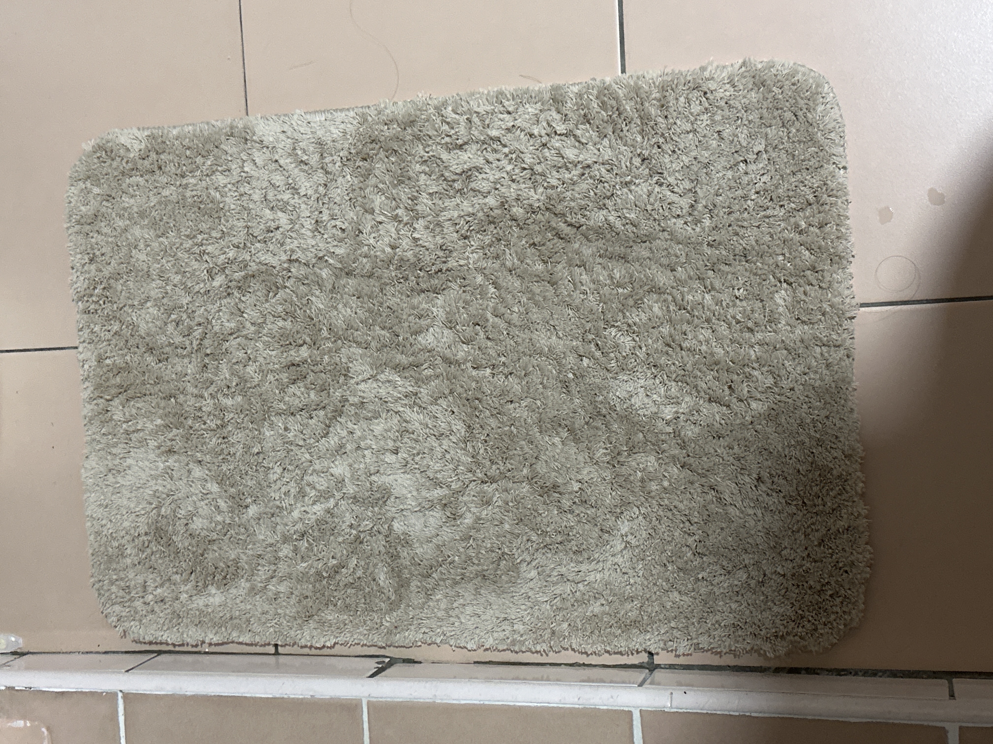 Customer home photo 2: Color is nice light beige and non slippery mat.