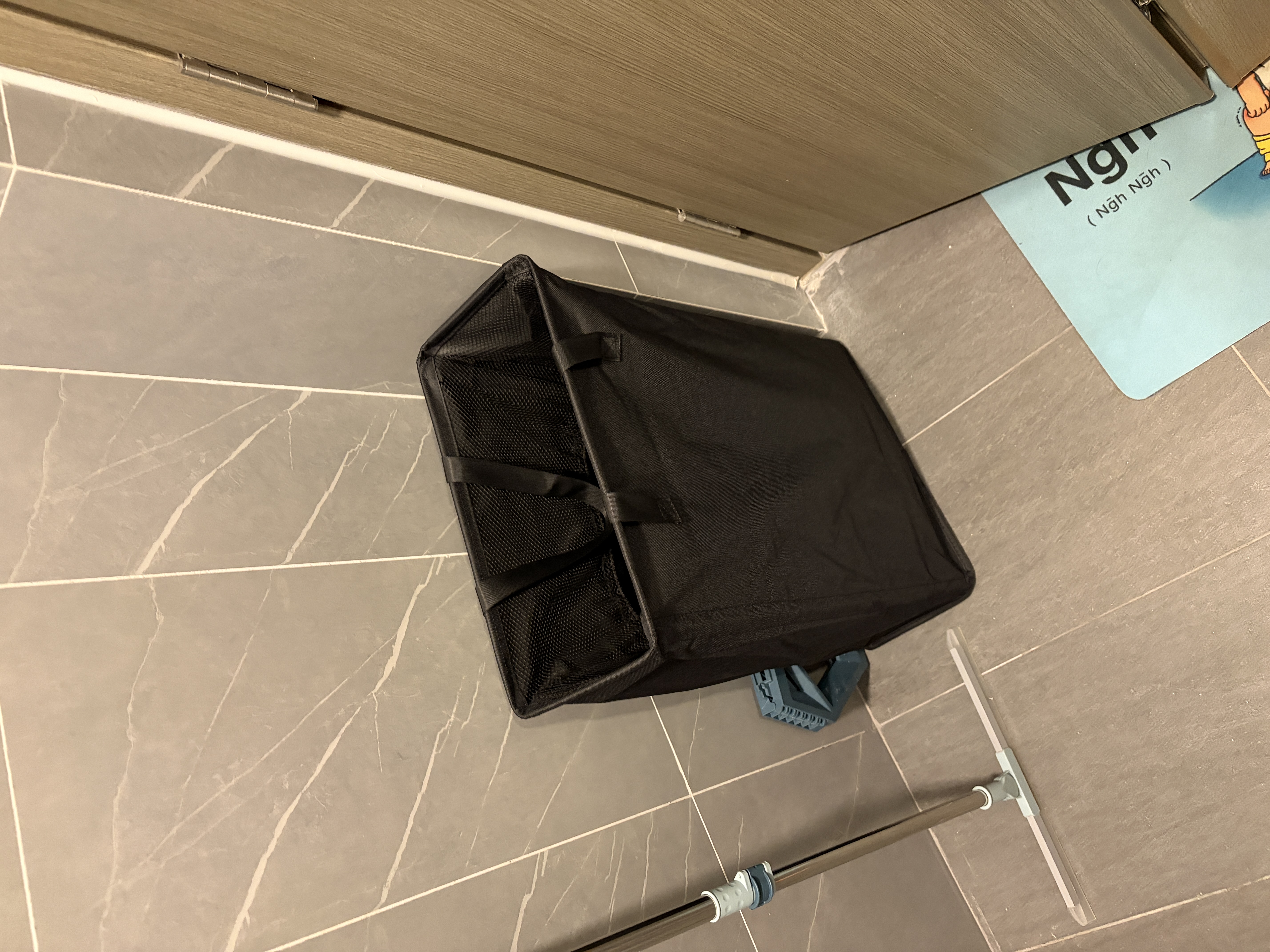 Customer home photo 1: The laundry hamper is tucked away behind my door and because of this I like this design