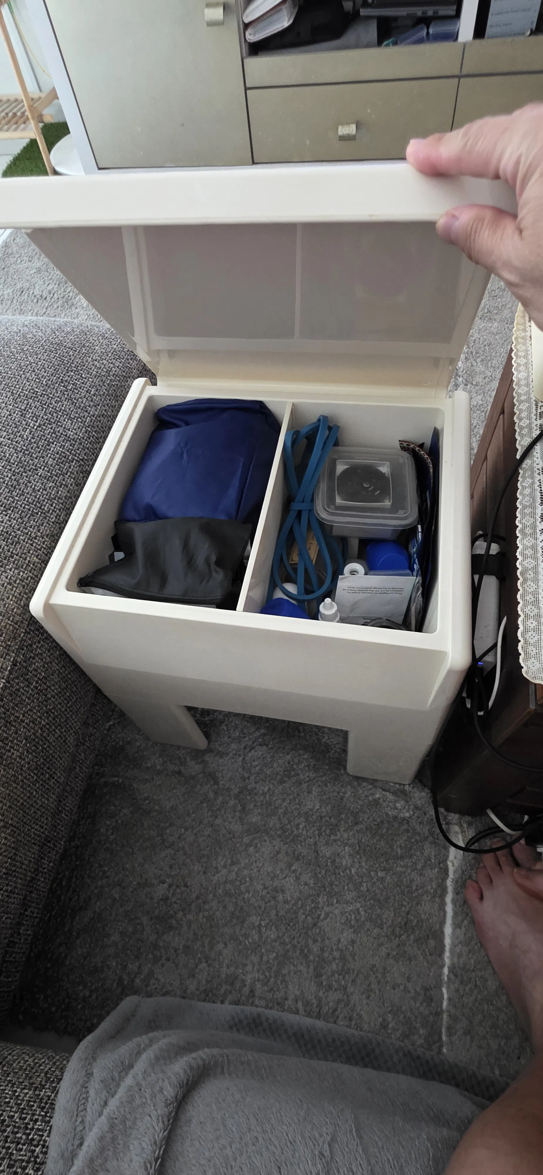Customer home photo 1: Solid build and can be used as a sode stool. The internal storage is amazing. Hide away all my rubbished ;)