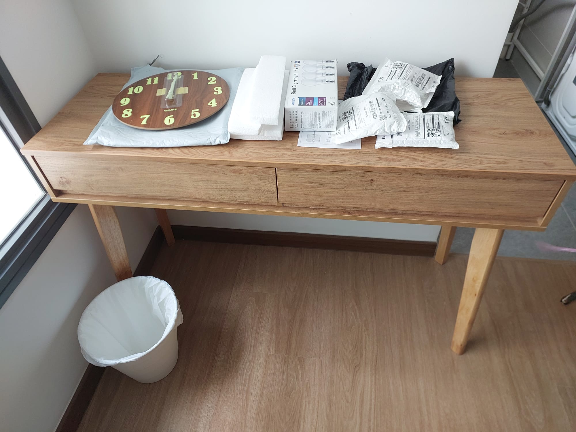 Customer home photo 2: Overall satisfied with this table but the drawers slide out too easily and when I was trying to move the table, the drawers slid out. Can be quite dangerous. Hipvan needs to feedback to the manufacturer to install better drawer rails that don't slide out so easily.