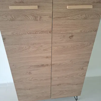Customer home photo 4: Slim and tall shoe cabinet with steady legs able to store more shoes than I had expected!
