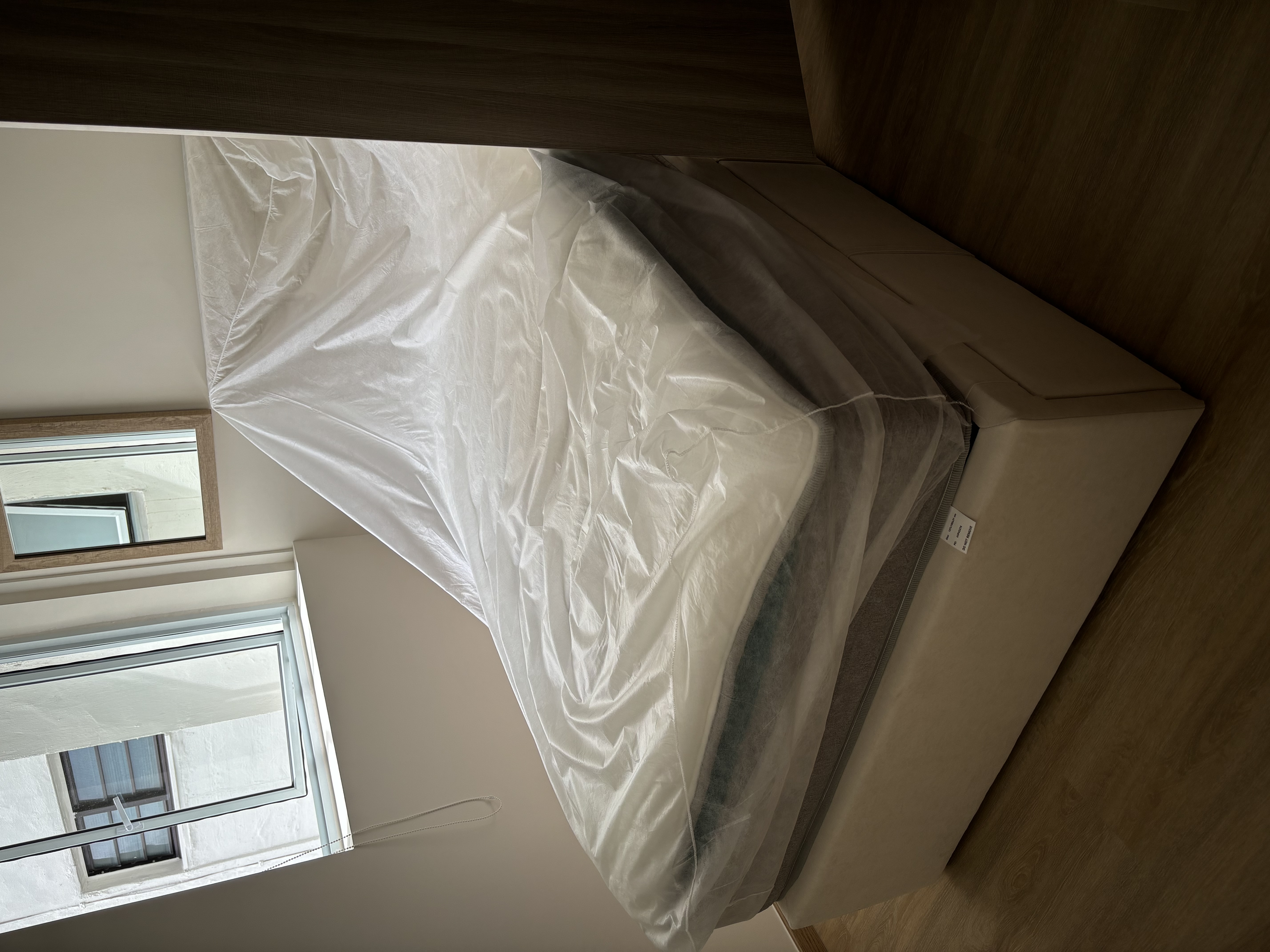 Customer home photo 15: The mattress is thick and heavy and comfortable. Good quality material. Delivery was efficient.