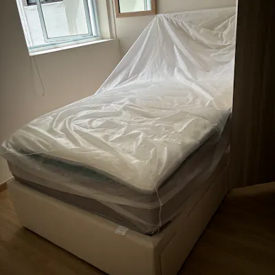 Customer home photo 15: The mattress is thick and heavy and comfortable. Good quality material. Delivery was efficient.