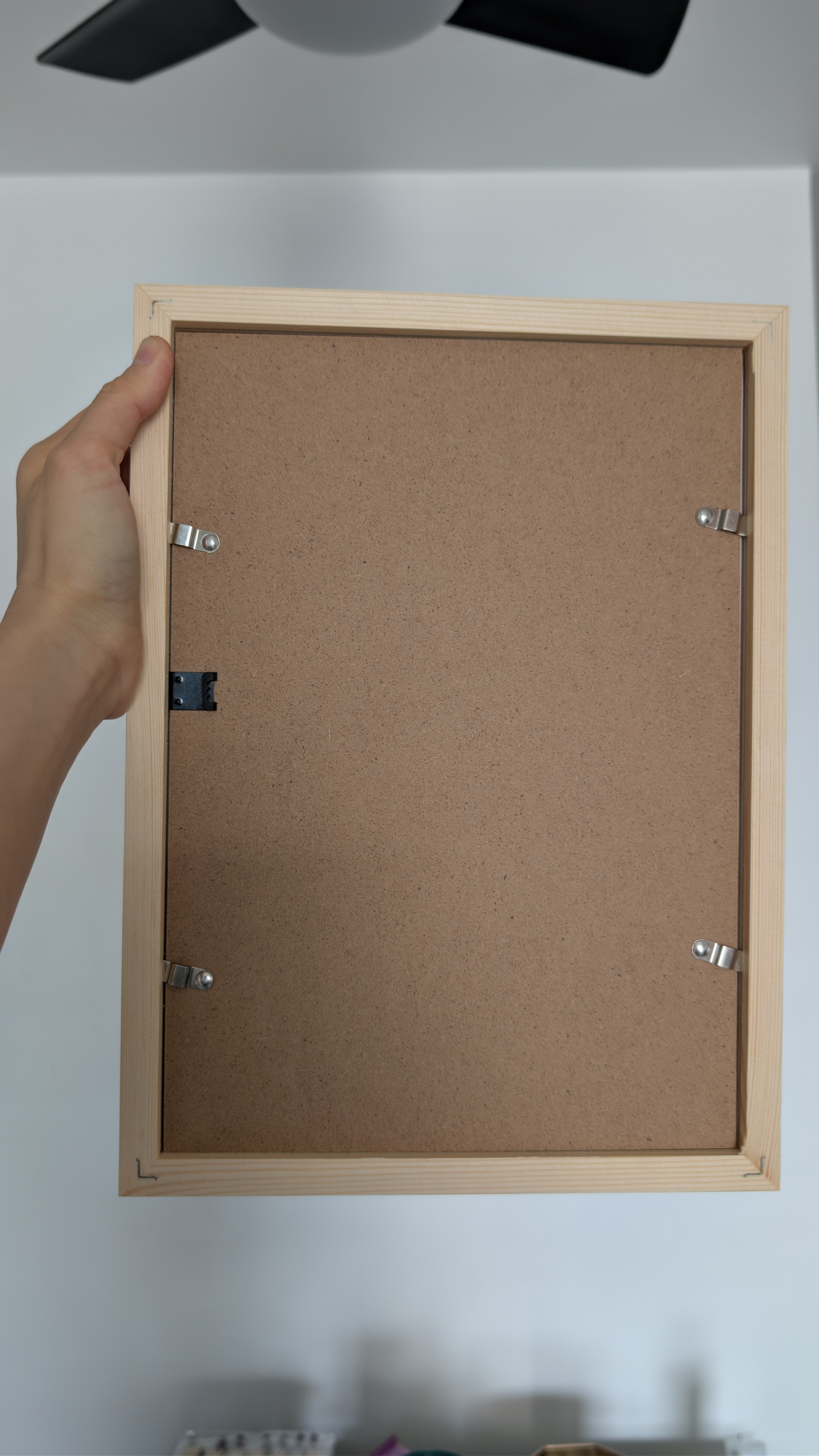 Customer home photo 4: Like it that it's wide enough for me to paste 3M tapes. I prefer this over IKEA's photo frames