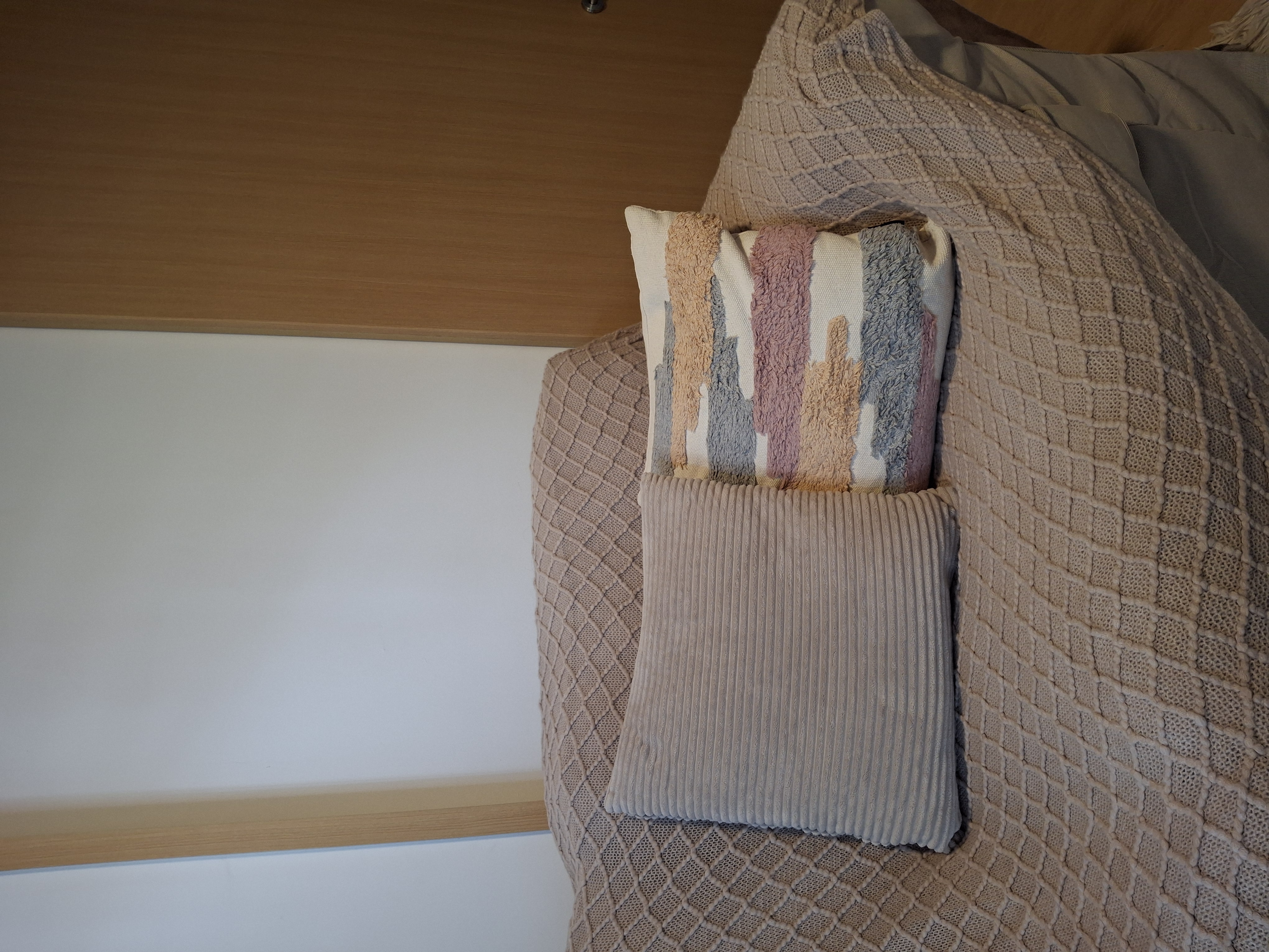 Customer home photo 5: The cushion insert has a firmness which I like. The edge of the cushion has a trimming which is neat and will not unpick easily.