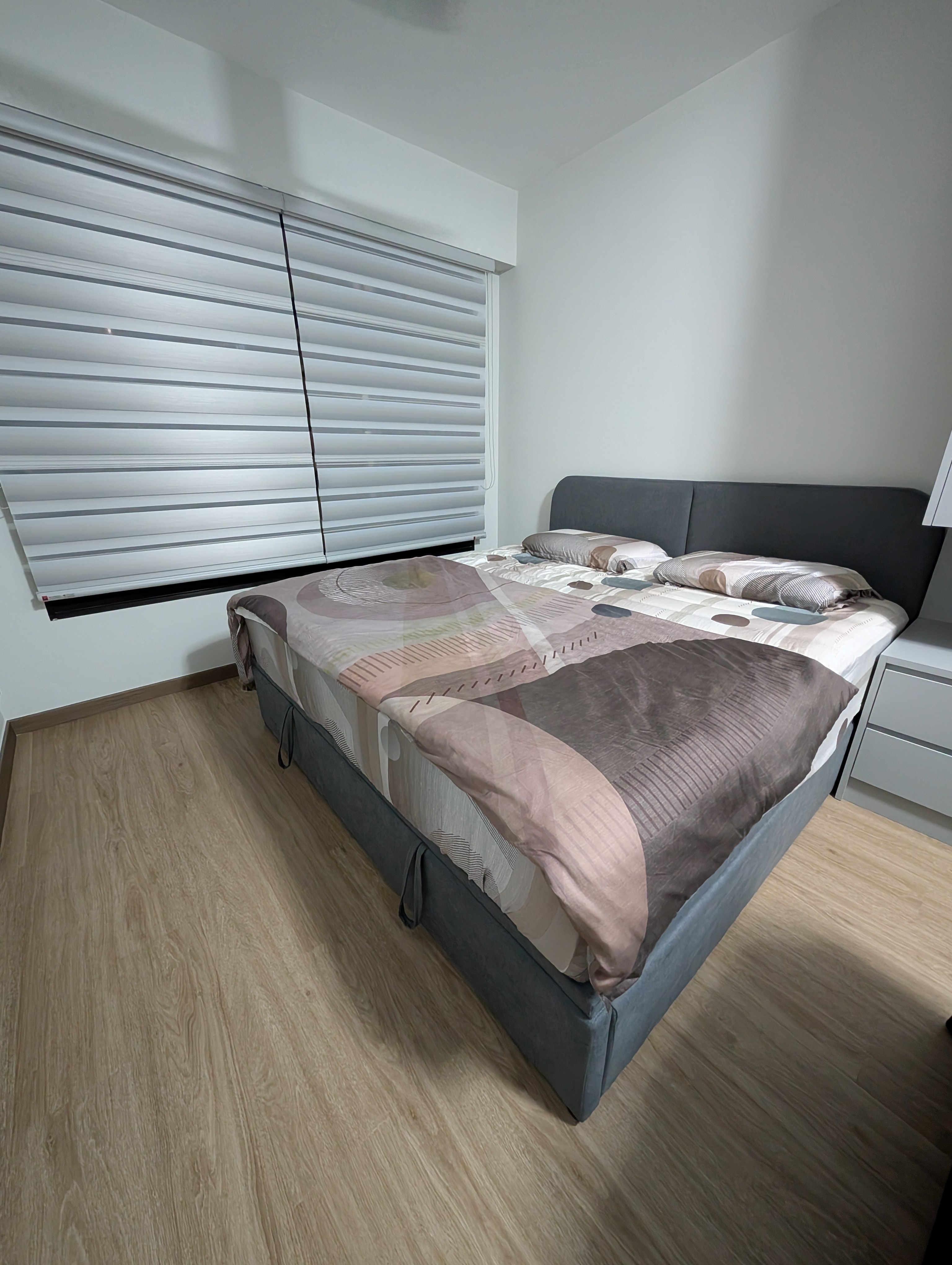 Customer home photo 6: Managed to find a storage bed frame of our height preference to suit our bedroom. Shout-out to Ju at sales showroom who helped in explaining the details.