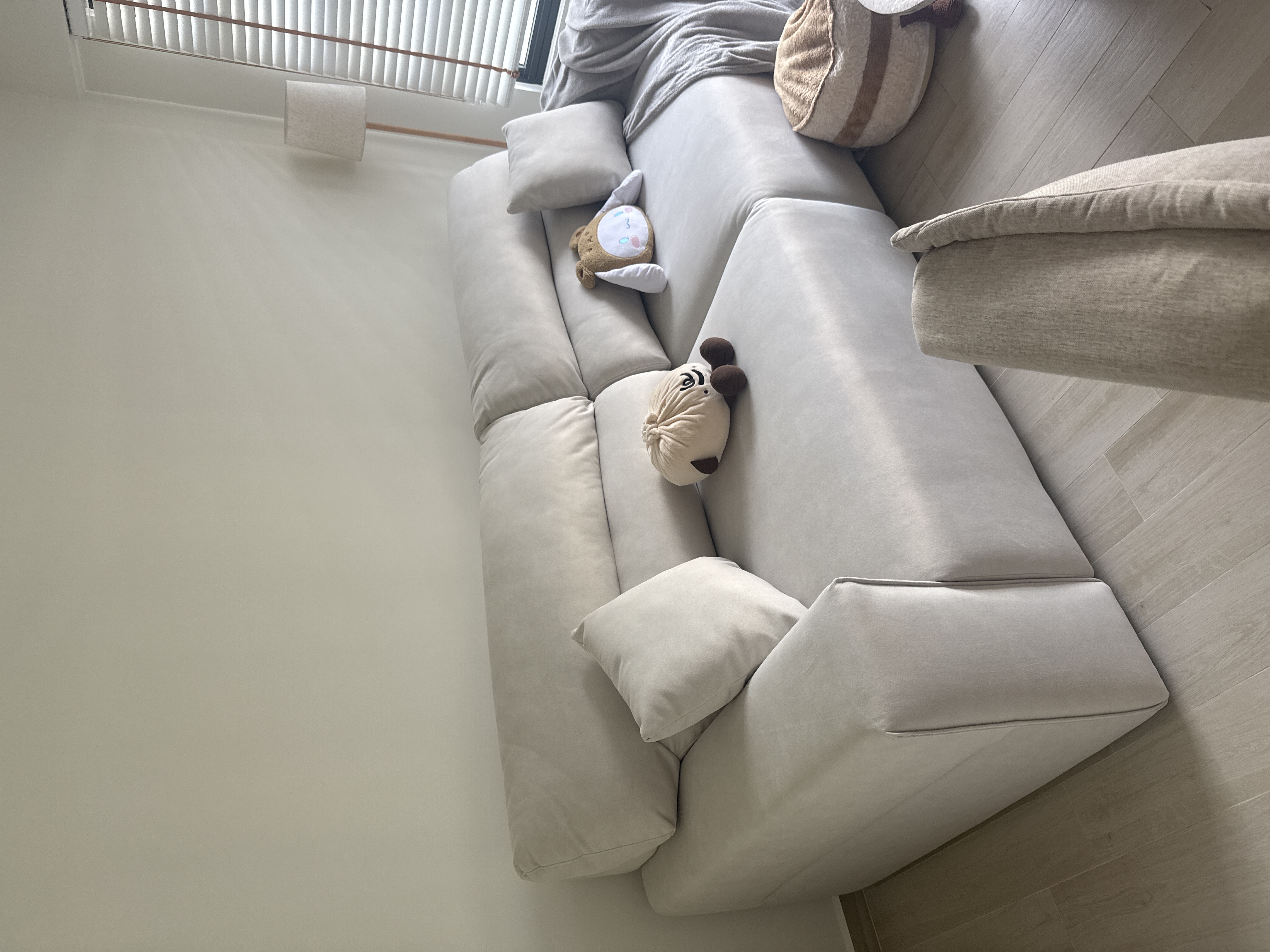 Customer home photo 2: sofa is not as white as what’s shown in the image. it’s more greyish. however the material is really good and comfortable. no regrets