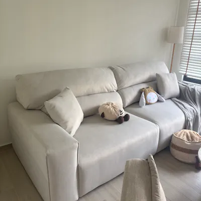 Customer home photo 2: sofa is not as white as what’s shown in the image. it’s more greyish. however the material is really good and comfortable. no regrets
