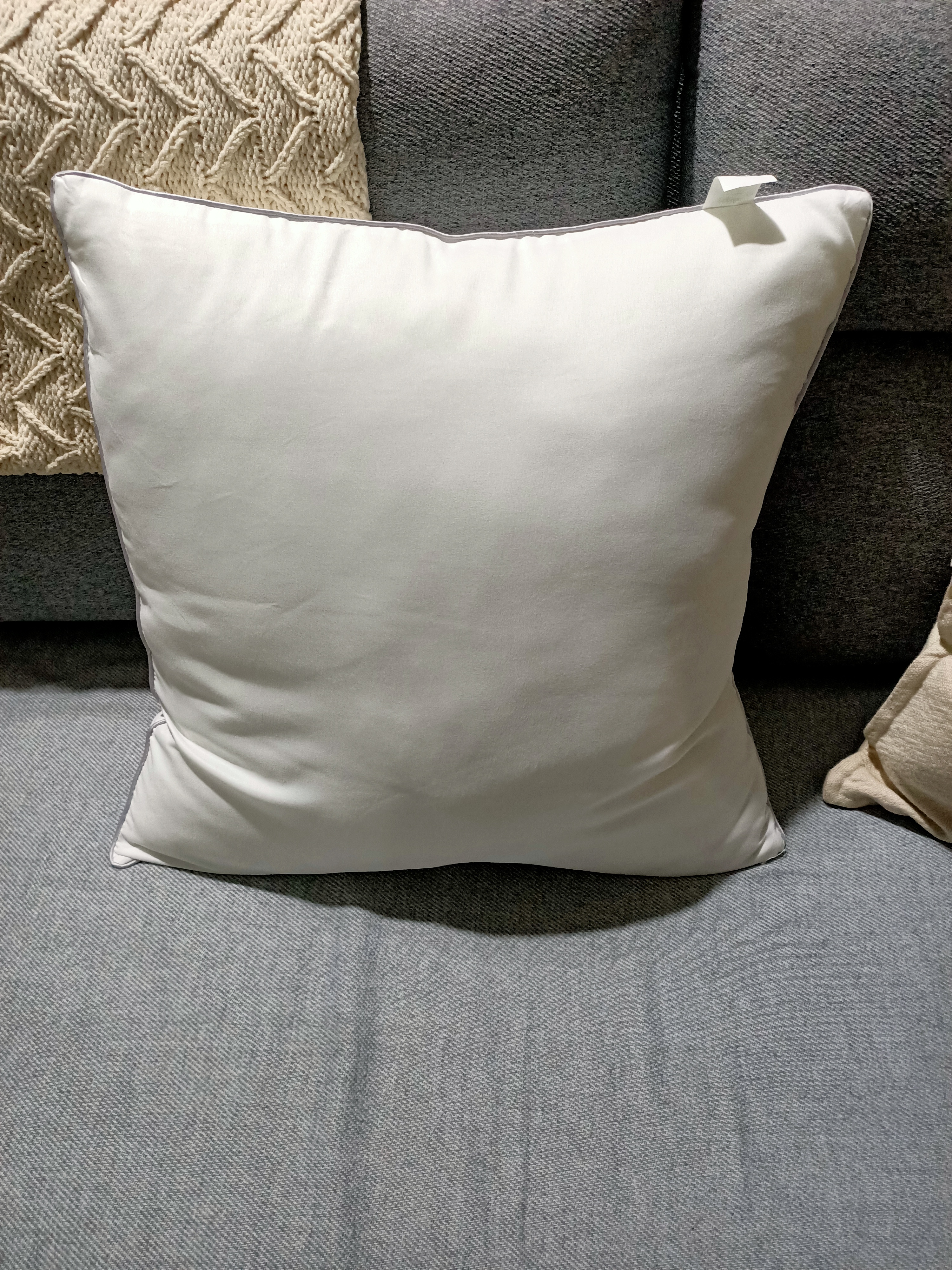 Customer home photo 12: Nice fit for Elly Knitted Cushion cover that I bought for my sofa.  Cushion is fluffy soft that makes it lovely to hug.