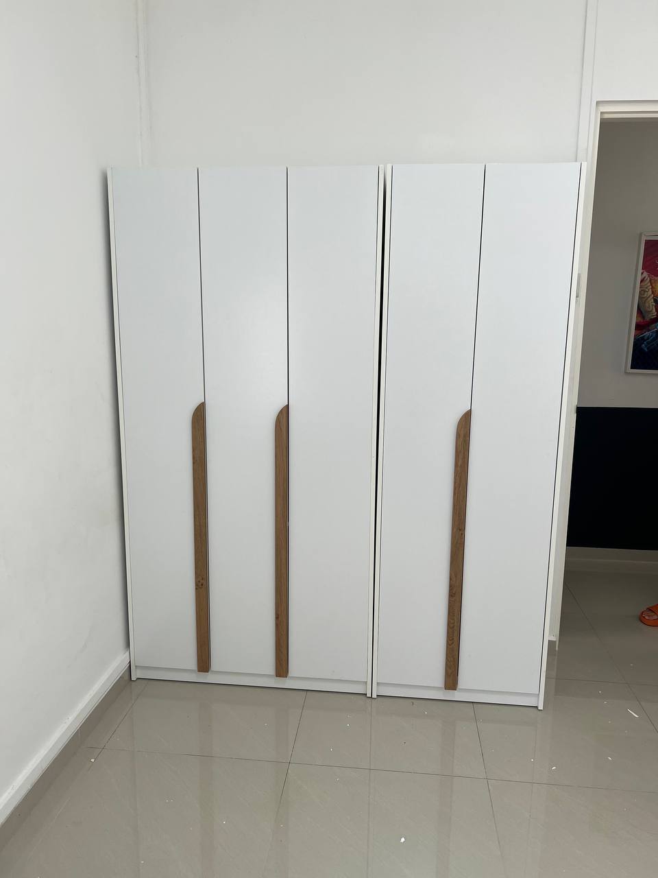 Customer home photo 15: Really like how sleek and space saving this wardrobe is!