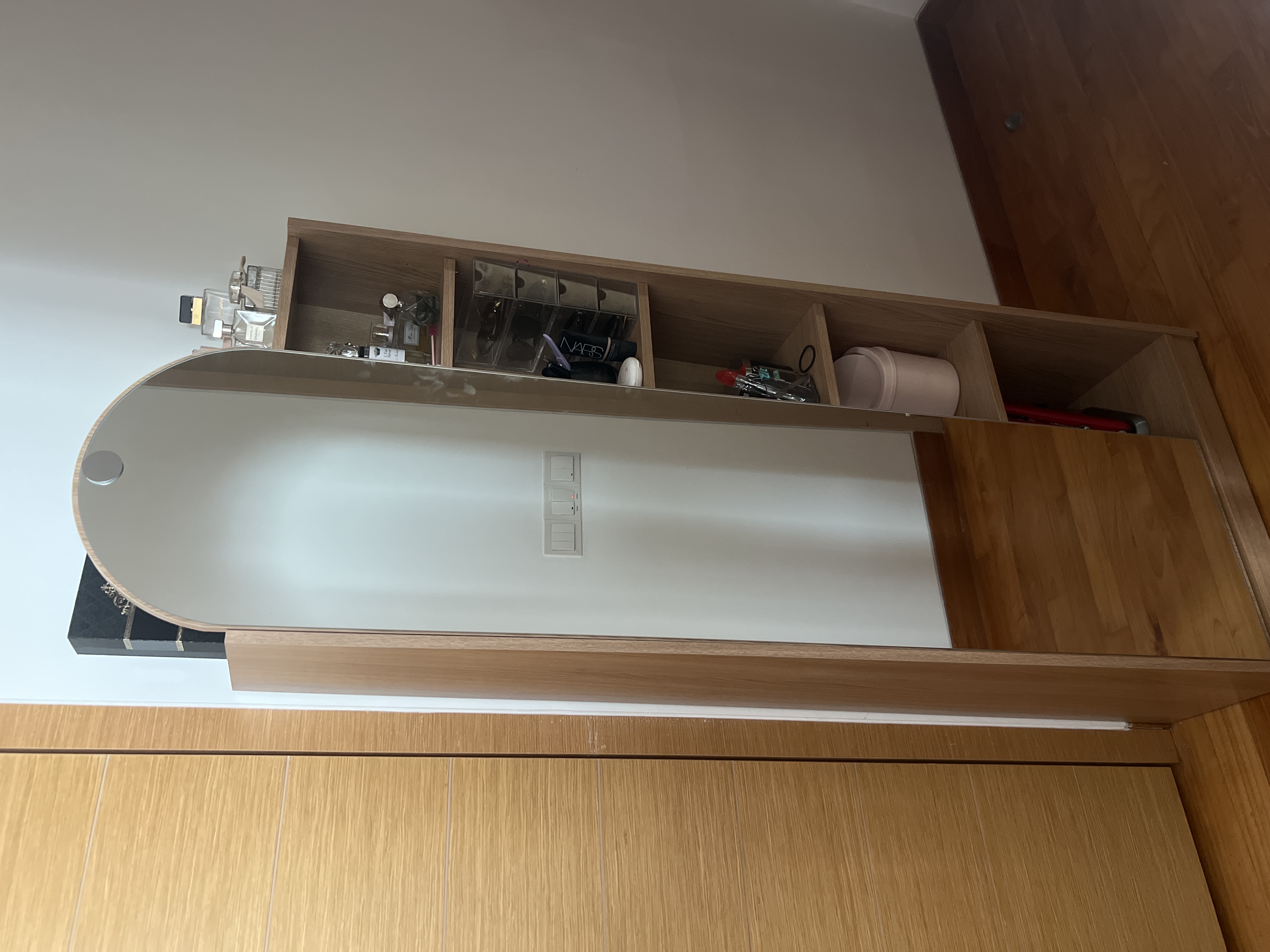 Customer home photo 24: It’s beautiful and compact so doesn’t take much space - the mirrored door is quite heavy so you must figure out a way to connect it to the wall behind