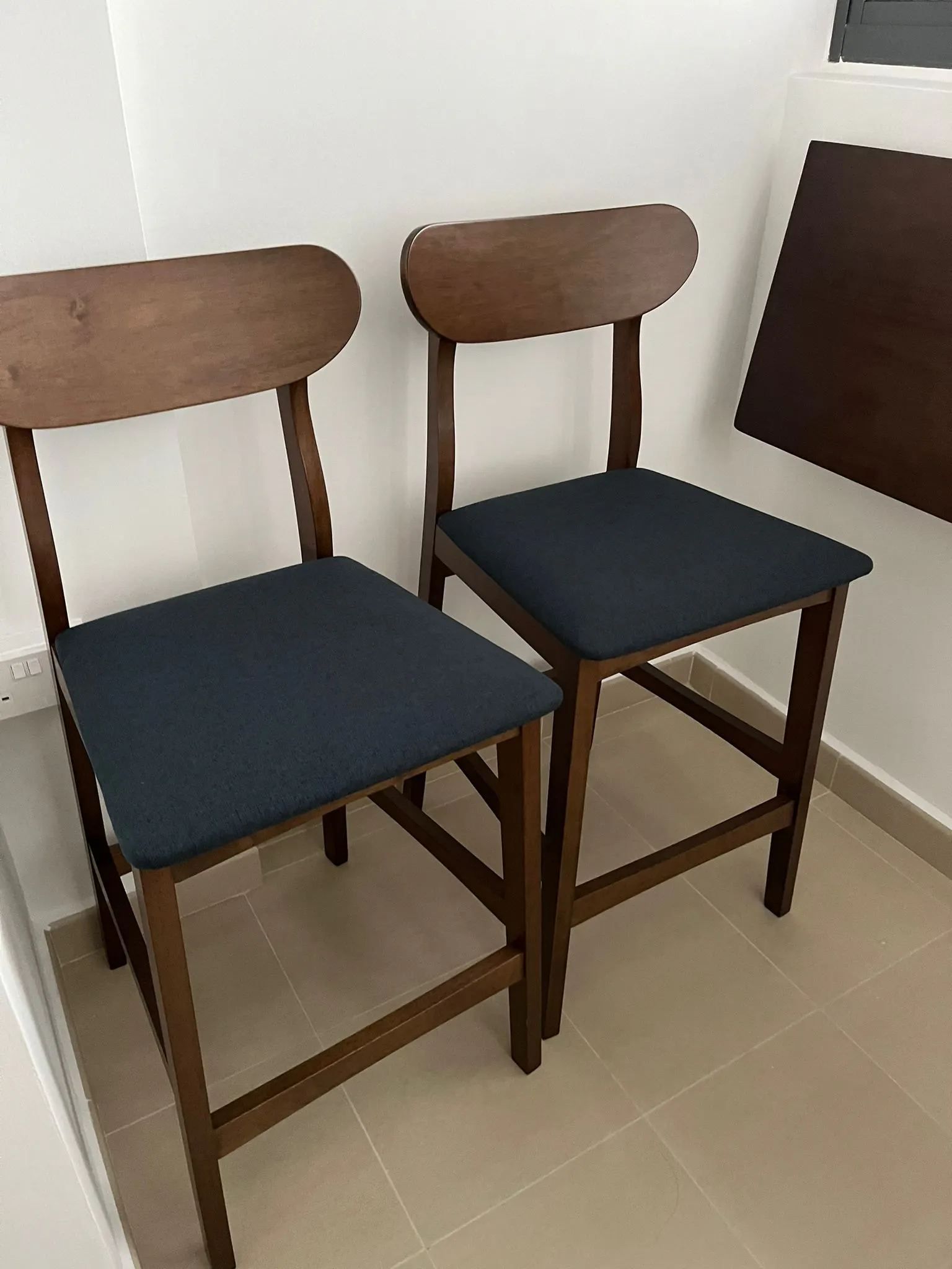 Customer home photo 2: Comfortable counter chair. Could be sturdier.
