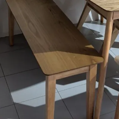 Customer home photo 2: The bench is sturdy comfortable and fits nicely withe dinning set