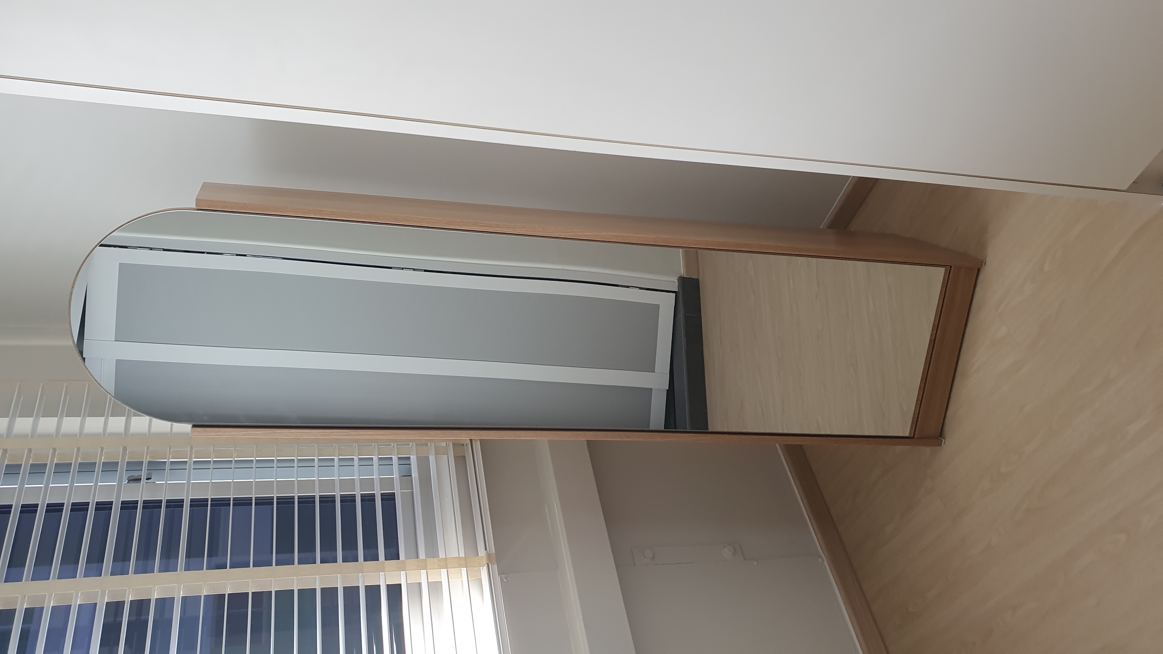 Customer home photo 11: High quality and plenty of storage behind the mirror.