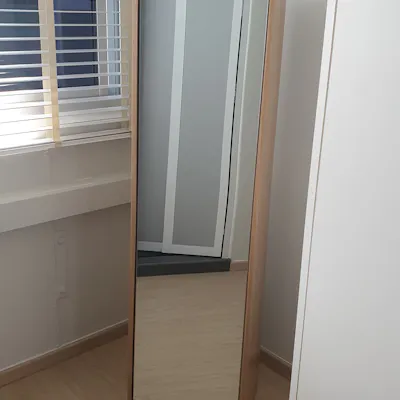 Customer home photo 11: High quality and plenty of storage behind the mirror.