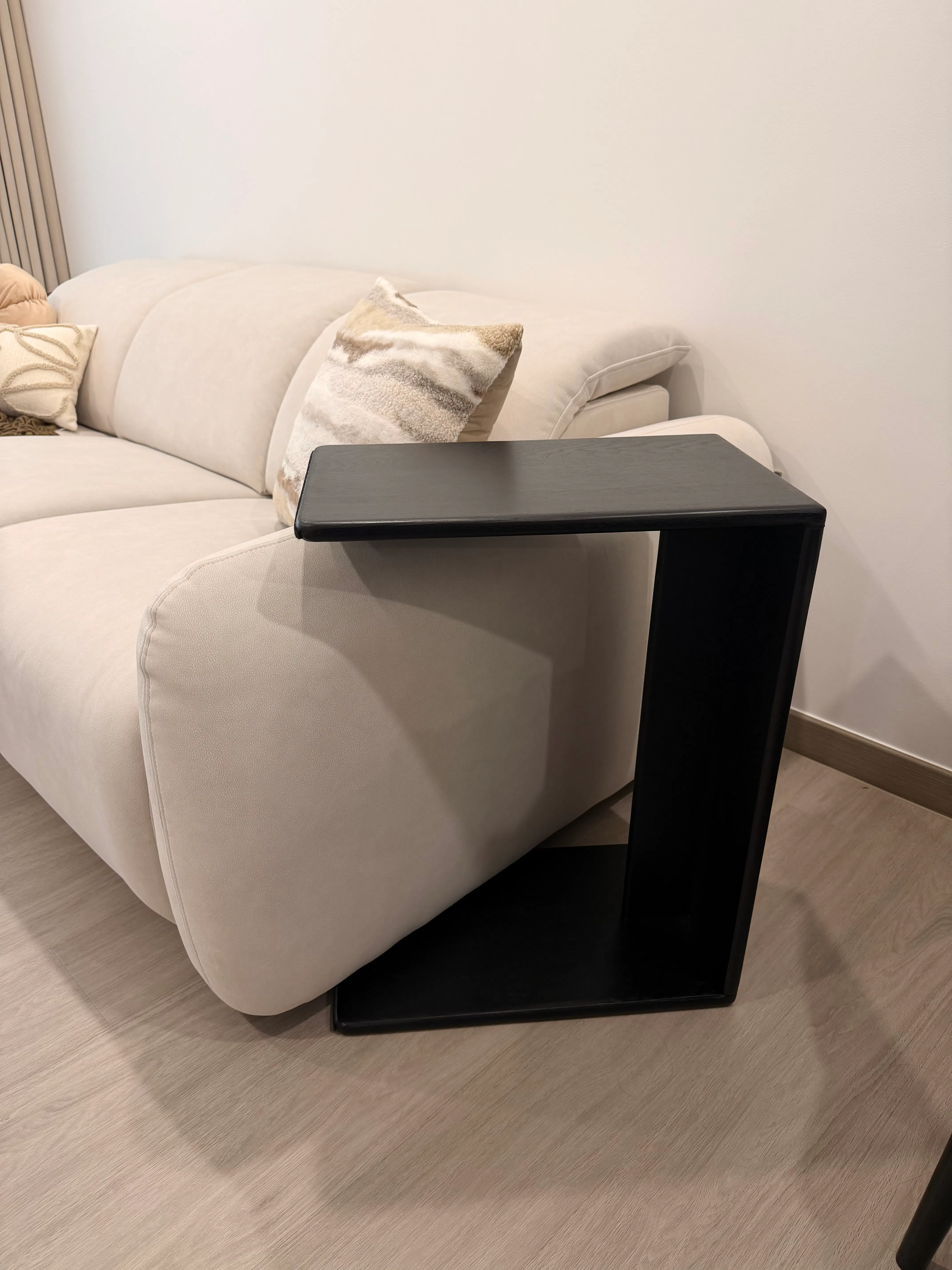 Customer home photo 3: Absolutely love this side table! Super versatile and it comes with a soft base sticker that prevents scratches while we move it around the floor, major love! Highly recommend 🥰