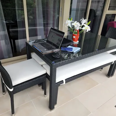 Customer home photo 1: Bondi outdoor dining set makes dining at my balcony resort-like. Cushion adds comfort for long chats over dinner