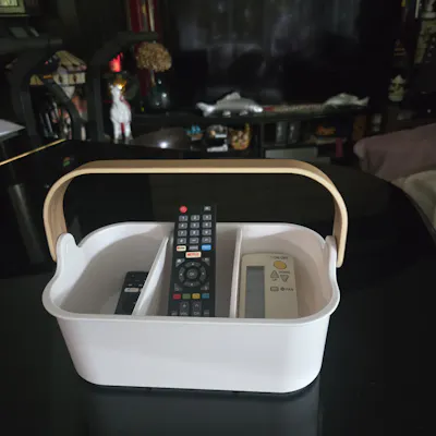 Customer home photo 1: Very practical. No more searching all over the place looking for a remote control. The white colour stands out and it looks classy.