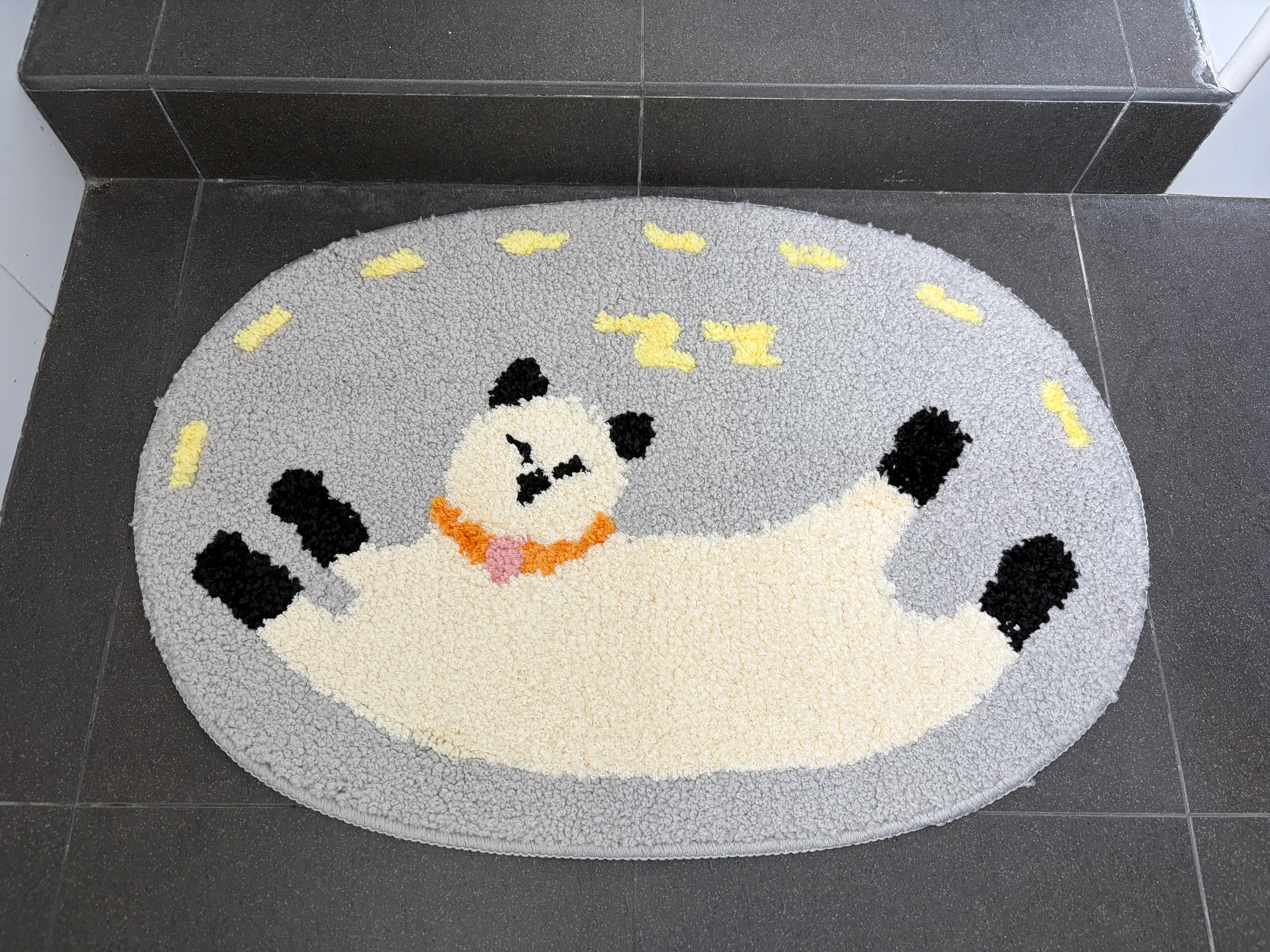 Customer home photo 1: Soft and fluffie, perfect sized bathroom mate which matches my tiles. Love the sleepy cat design!