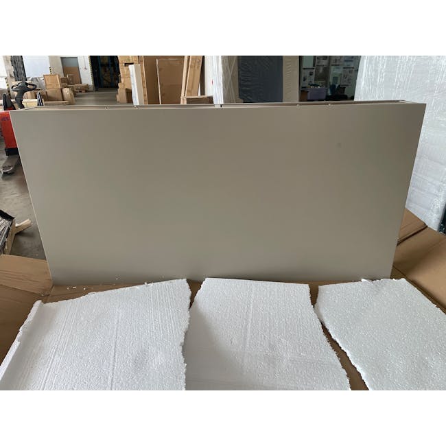 (As-is) Brexley Coffee Table - 2 - White rectangular panels, cardboard boxes, industrial warehouse, shipping containers