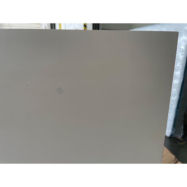 (As-is) Brexley Coffee Table - 3 - Industrial workspace with smooth, gray surface, Transparent plastic sheet in the